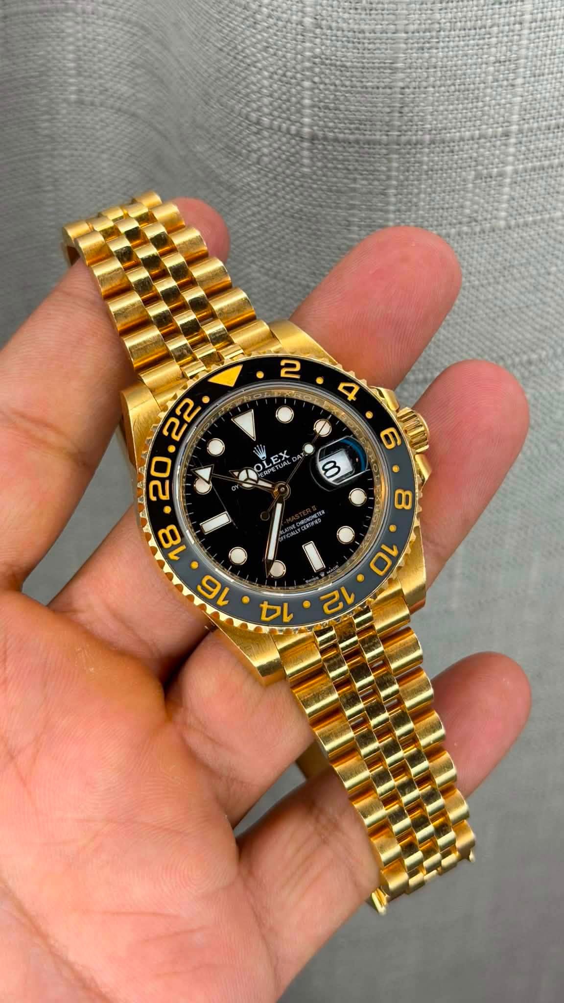 May be an image of wrist watch and text
