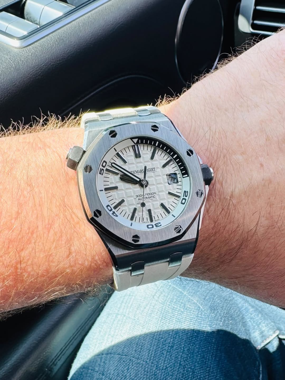 May be an image of wrist watch and text