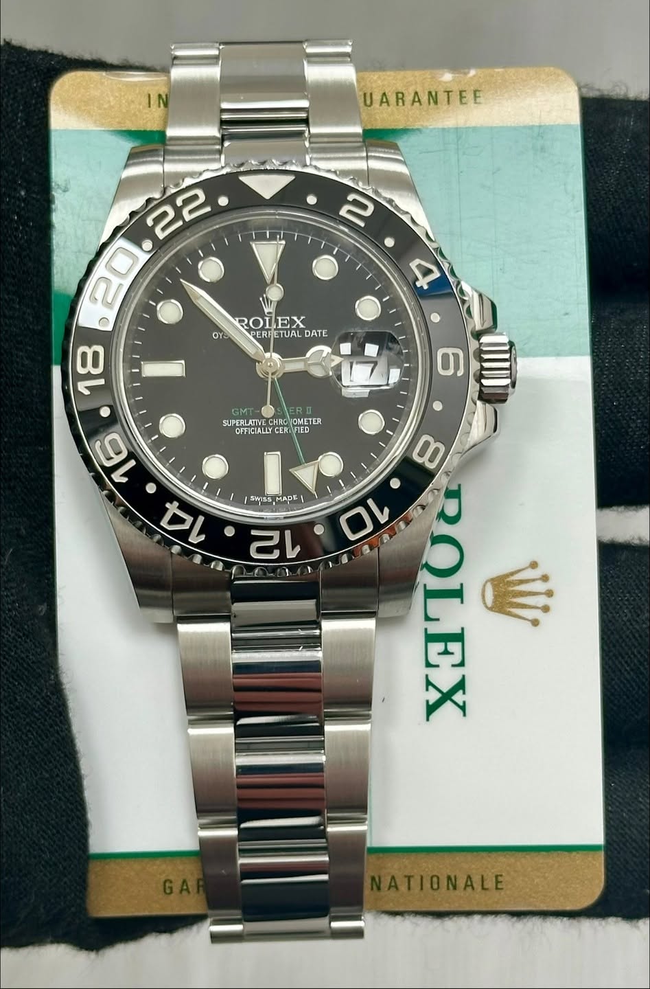 May be an image of wrist watch and text that says 'UARANTEE Or- 4 ROLEX PERHETUALD PERHETI PERE HETUAL DATE تا SUPERLATIVE CHR CHRO SUPERLAT ΑΓΤΗ OMETER FFICIALL CERIV CER…