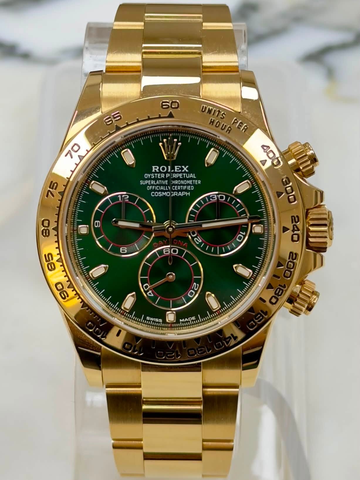 May be an image of wrist watch and text that says ' TNITS HOUR PER 0 ROLEX 0 400 OYSTERP PERPETUAL ETUAL 0 12 SUPERLATIVE HRONOMETER HRONOMETER 30 0 00 A 240 COSM COSMOSRAPH GRAPH…