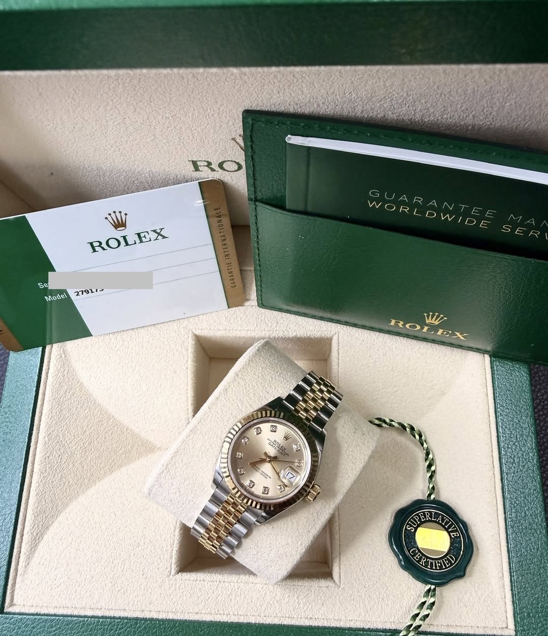 May be an image of wrist watch and text that says 'RO W ROLEX は上 Se Nodel 279119 GUARANTE ORLDWIDE DWIDE GUAR ANTE WORL SER ROLEX EX RO W 인 x ถ้ว A2 e 0 E 17 7 3 a 事注意 H E VE…