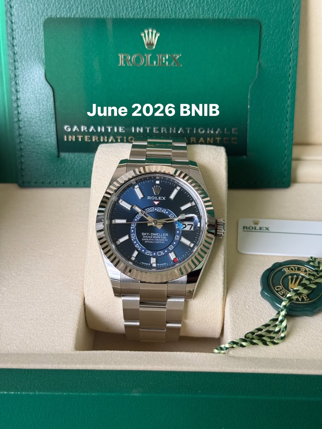 May be an image of wrist watch and text that says 'ROLX June2026BNIB June 2026 BNIB GARAHTIE INTERNA INTERHAT TON/ 1 RO ROLEX EX 22・24. 20 3 TE 0 4 27 ל 무 SKY-0 Y-OWELLE CIE…