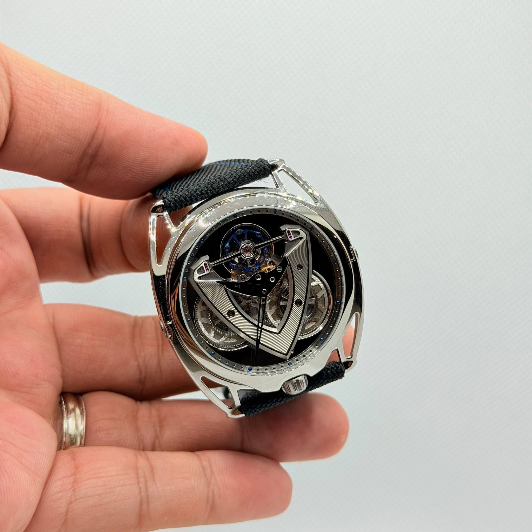 May be an image of digital watch and text