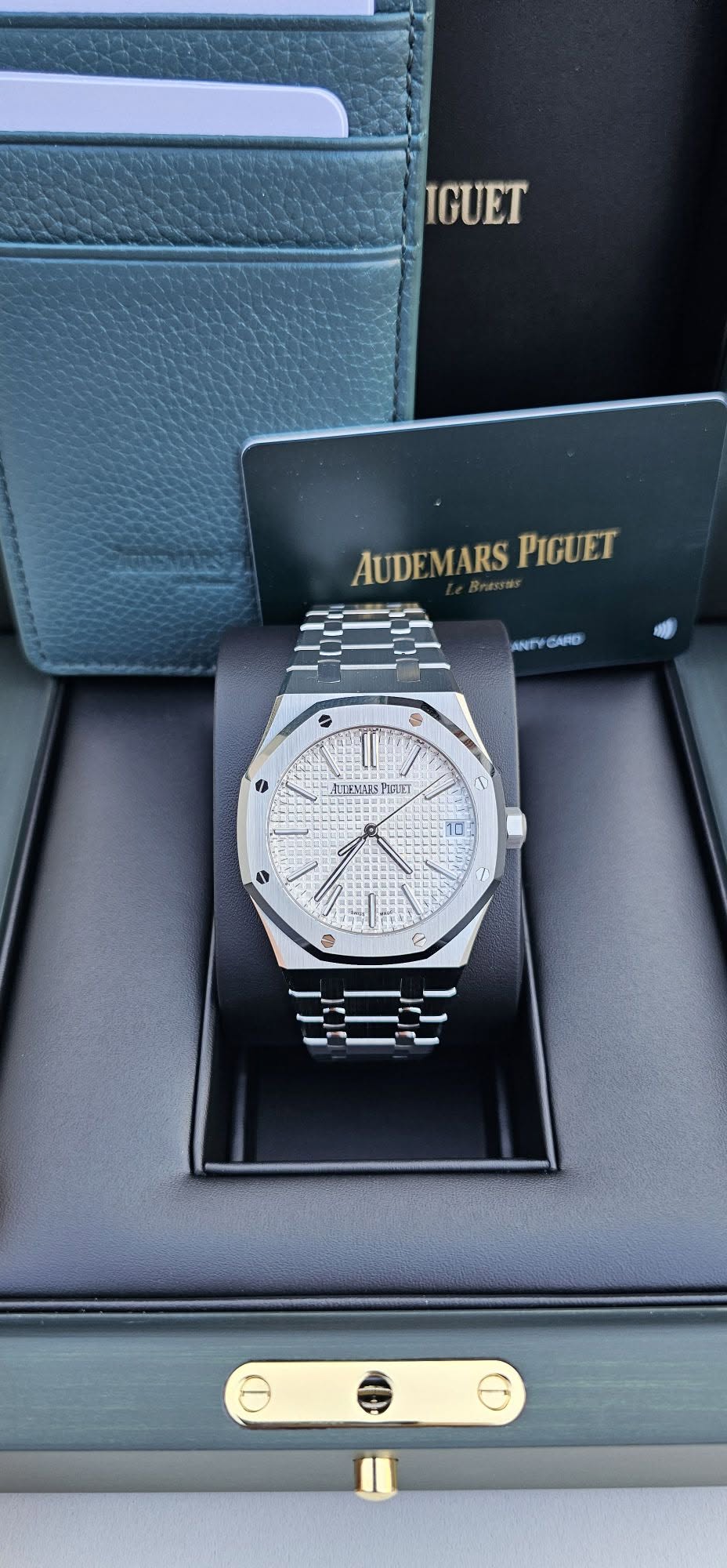 May be an image of wrist watch and text