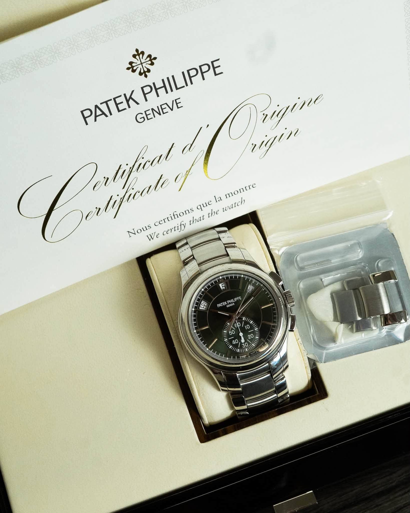 May be an image of wrist watch and text that says '崇 PT PATEK GENEVE GENEVE PHILIPPE Chmg Orizine rigin Dertifial tifical montre certifions que Nous We certify that the la watch r…