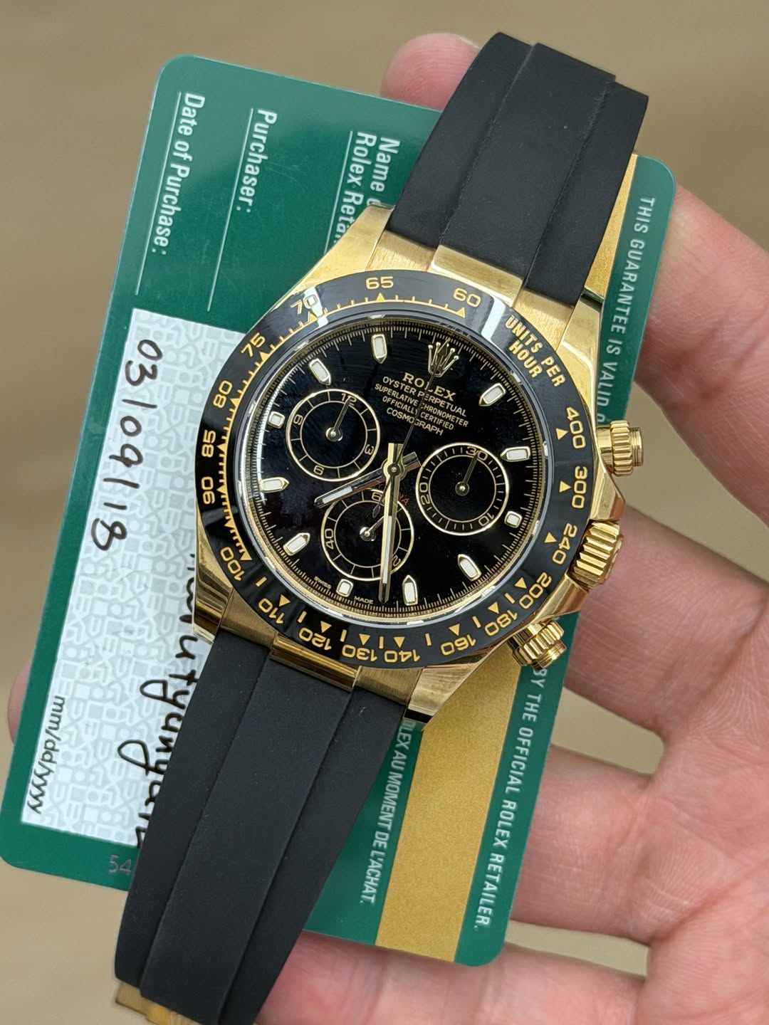 May be an image of wrist watch and text that says 'Date of Purchase: Purchaser: Rolex Name Reta 65 70 ခေ 60 αυ UPERLAT EX COSMO NRGAE RPETUAL (6 THIS GUARANTE HOUR Hoй UNITS IS PER…