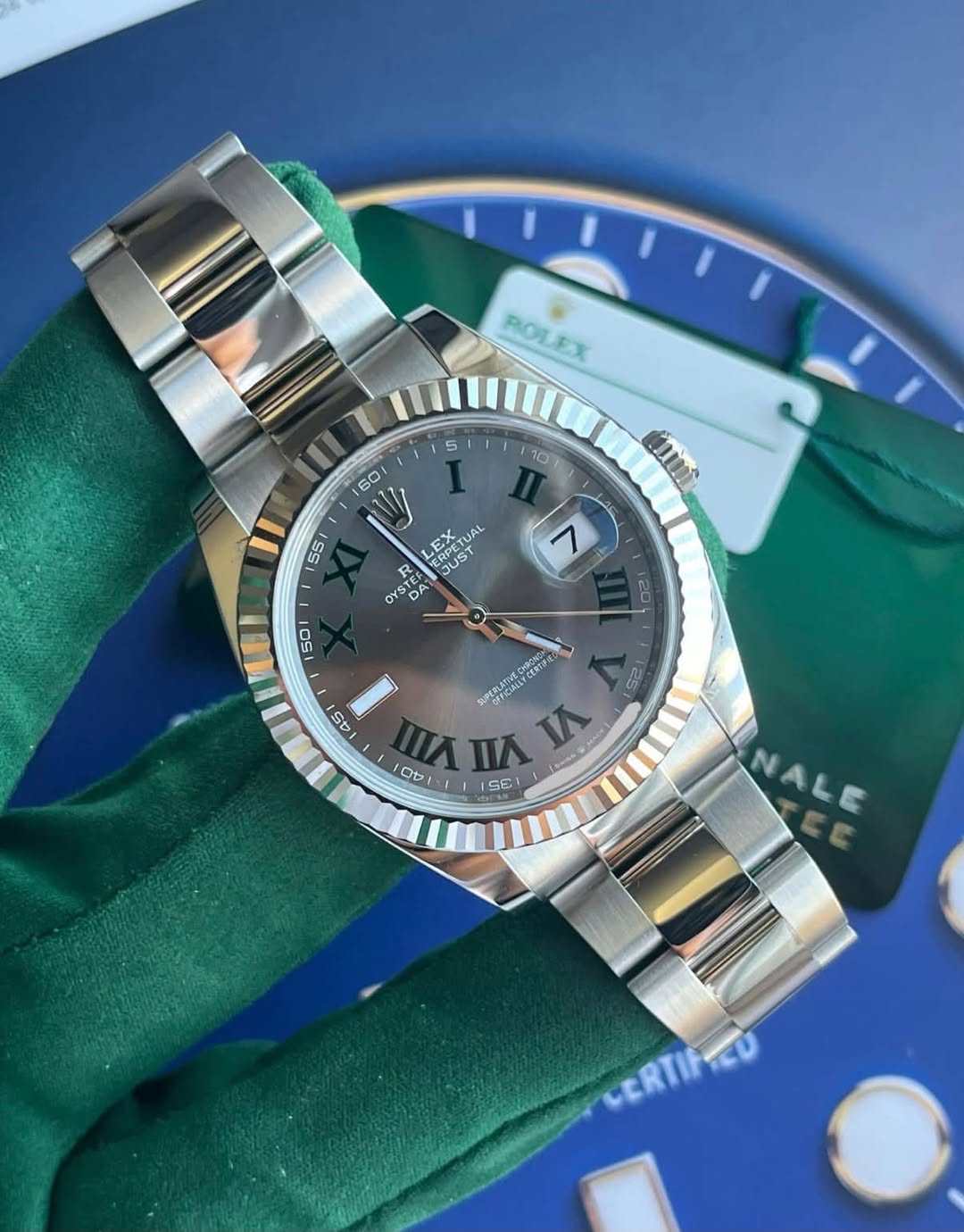 May be an image of wrist watch and text