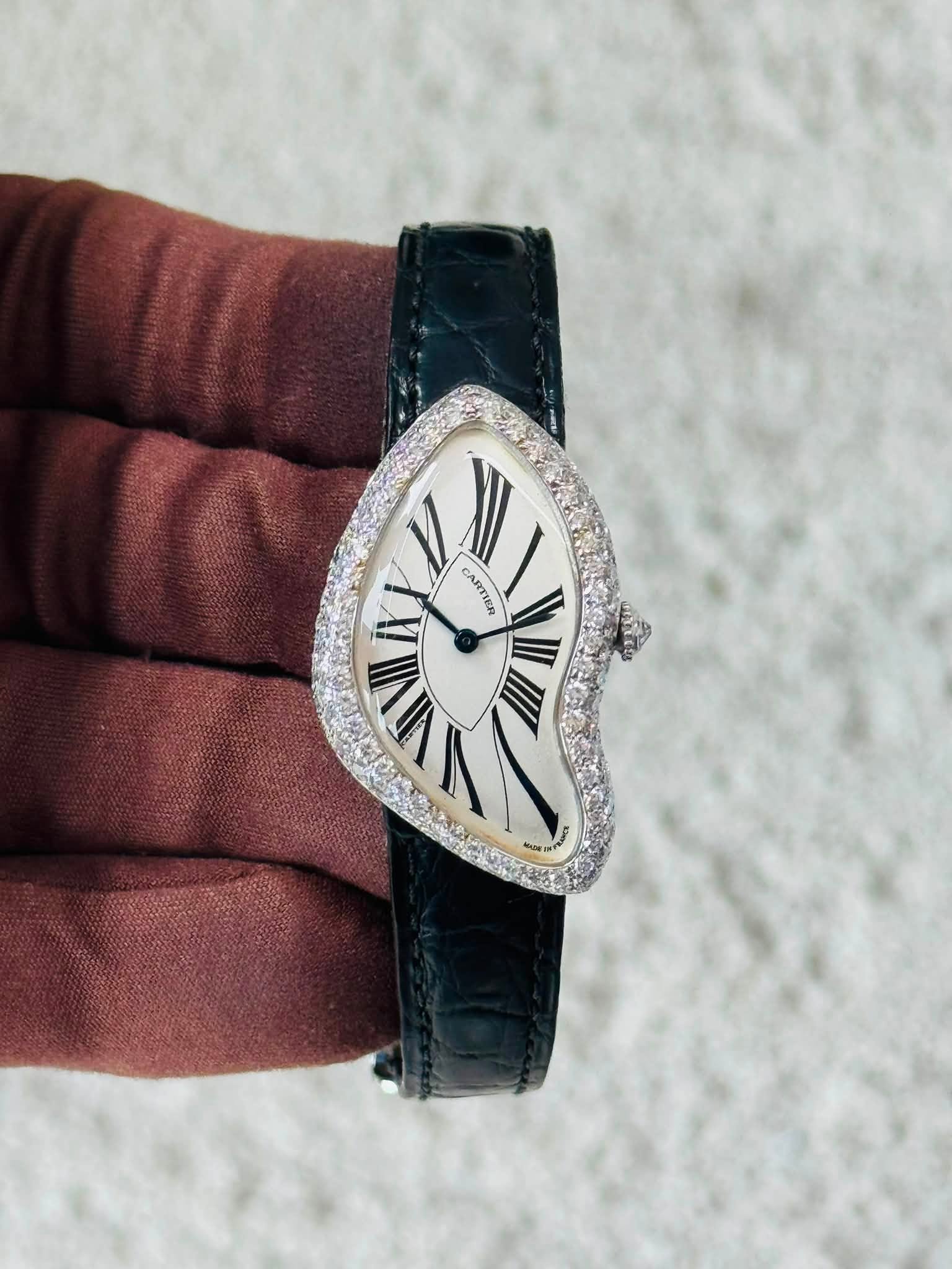 May be an image of wrist watch