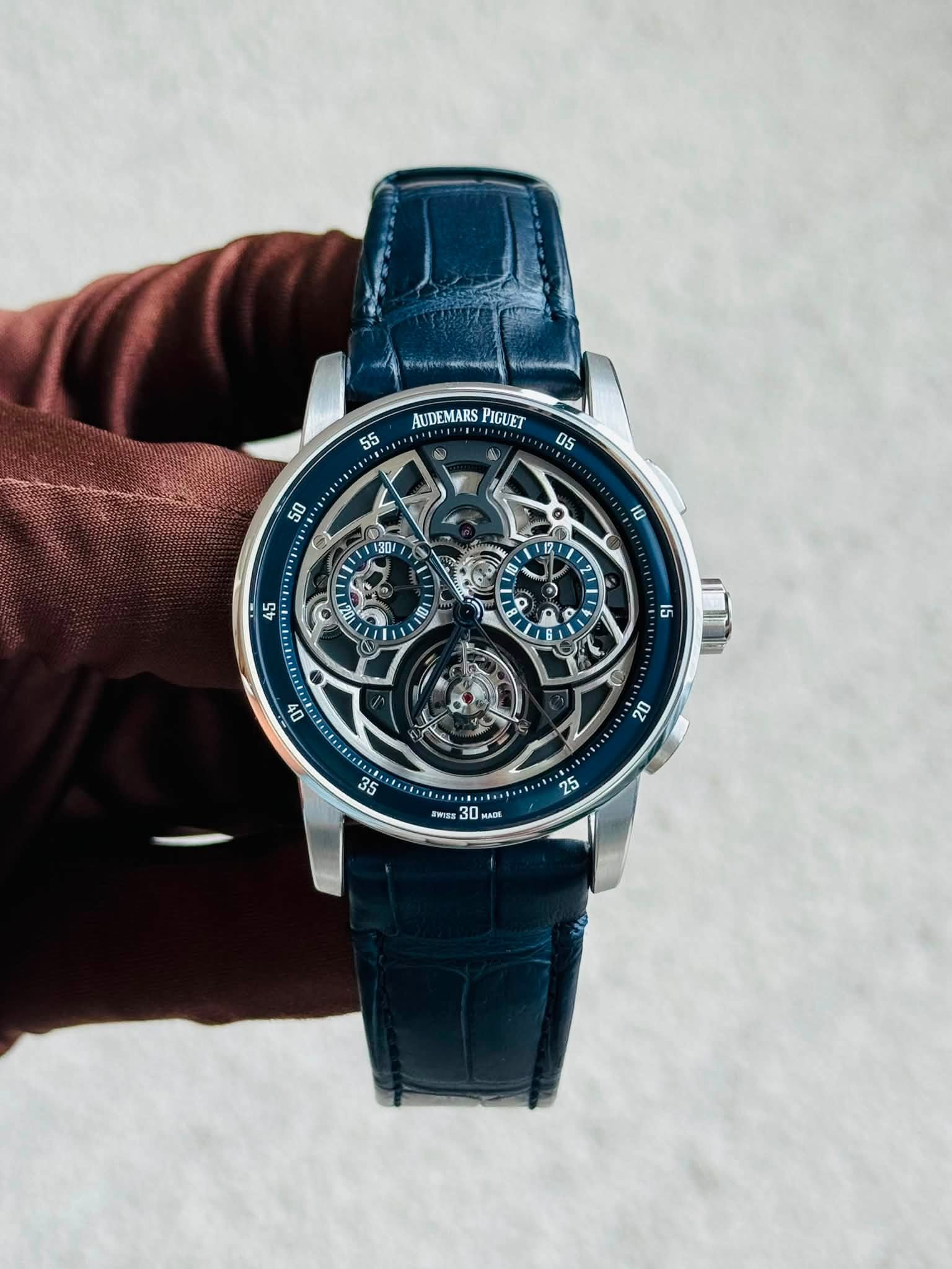 May be an image of wrist watch and text