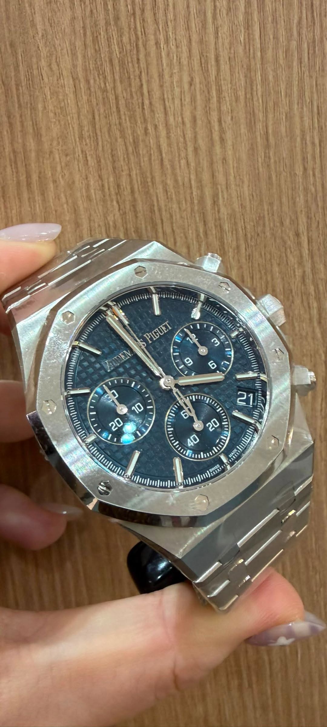 May be an image of digital watch and text