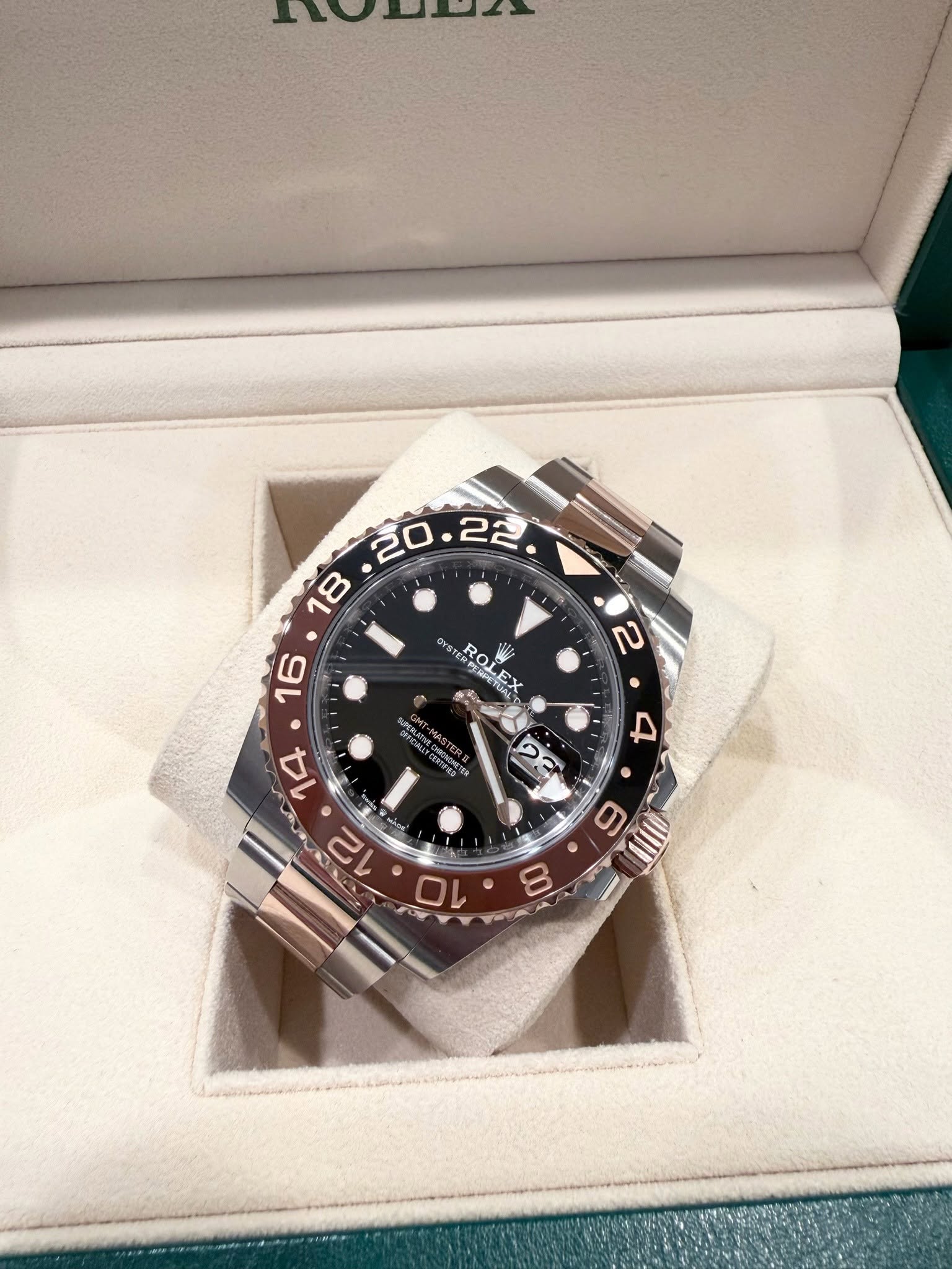 May be an image of wrist watch and text