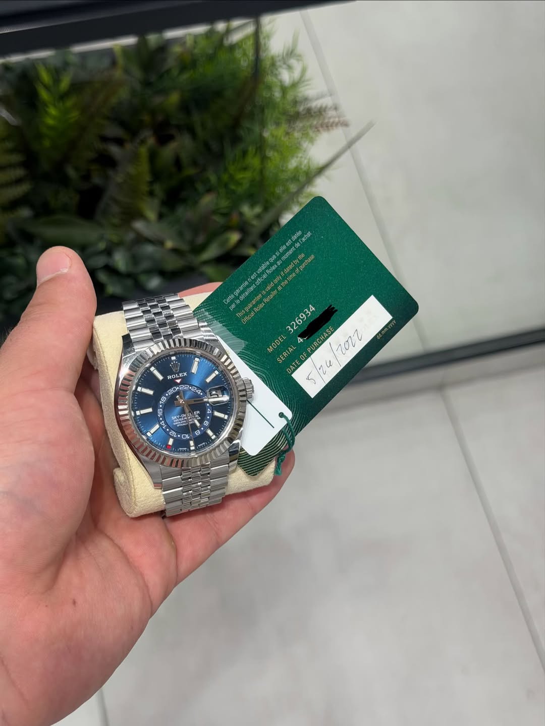 May be an image of wrist watch and text