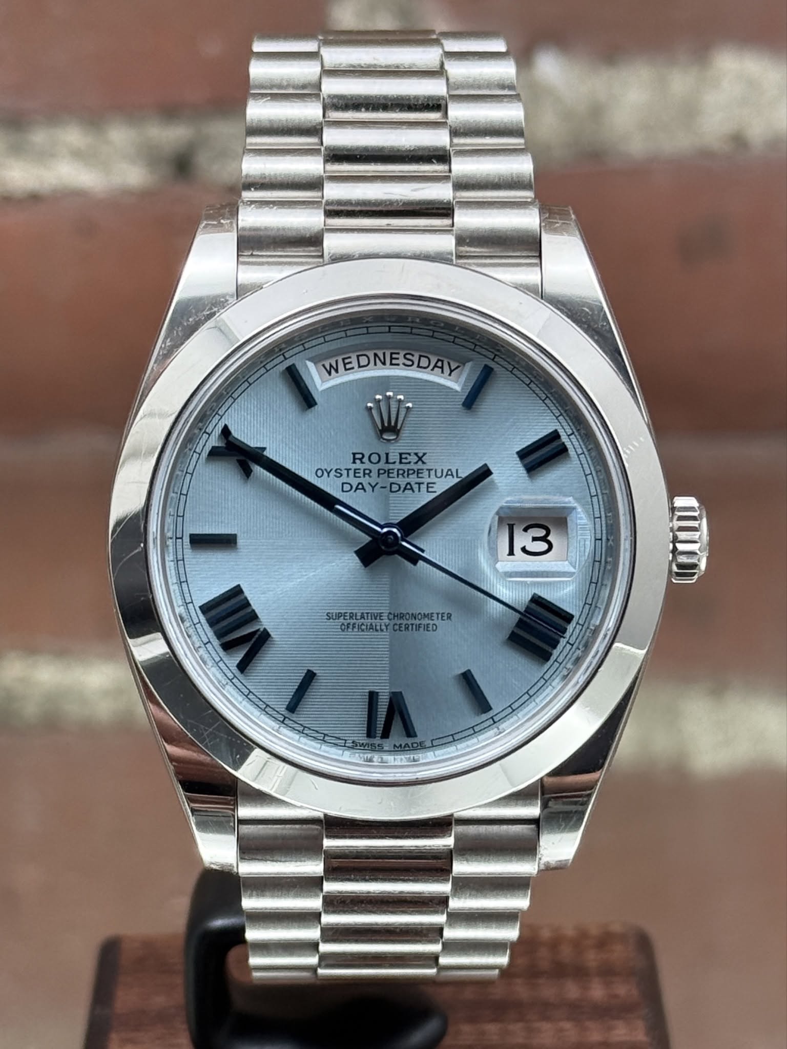 May be an image of wrist watch and text that says 'WEDNESDAY ROLEX OYSTER PERPET OYSTERPERPETUAL ERPETUAL DAY DAY-DATE DATE 13 3 SUPERLATIVEC SUPELATAEOTER SUIPERLATIVECHRONOMETEI…