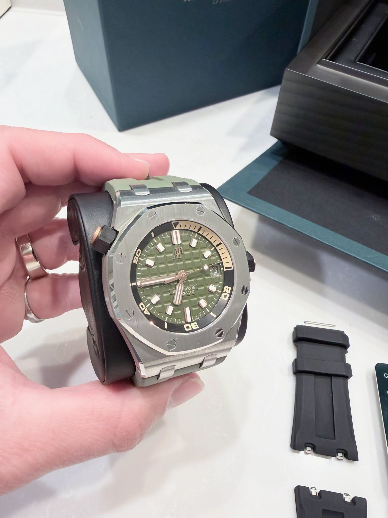 May be an image of digital watch and text