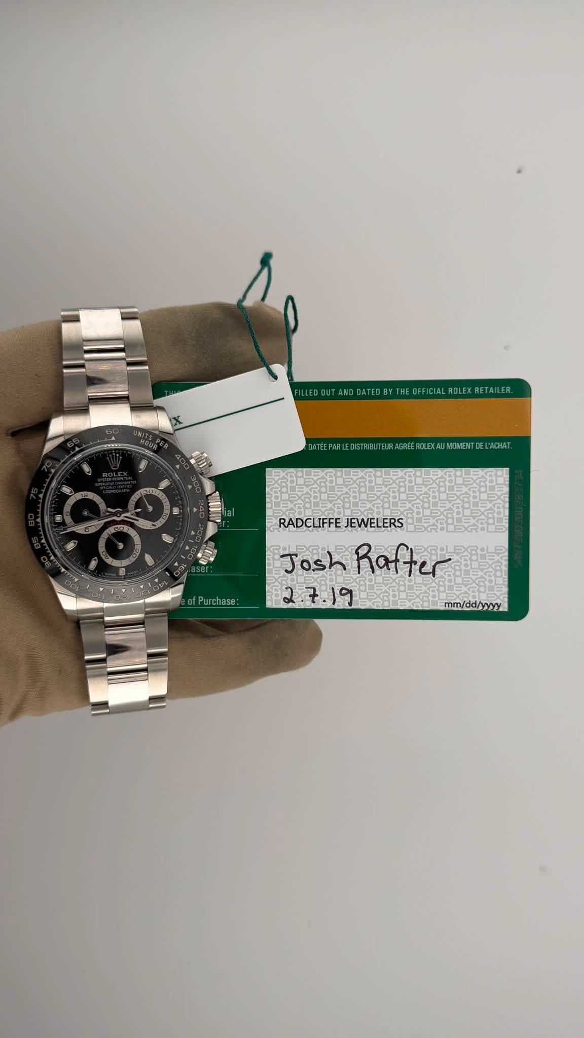 May be an image of wrist watch and text