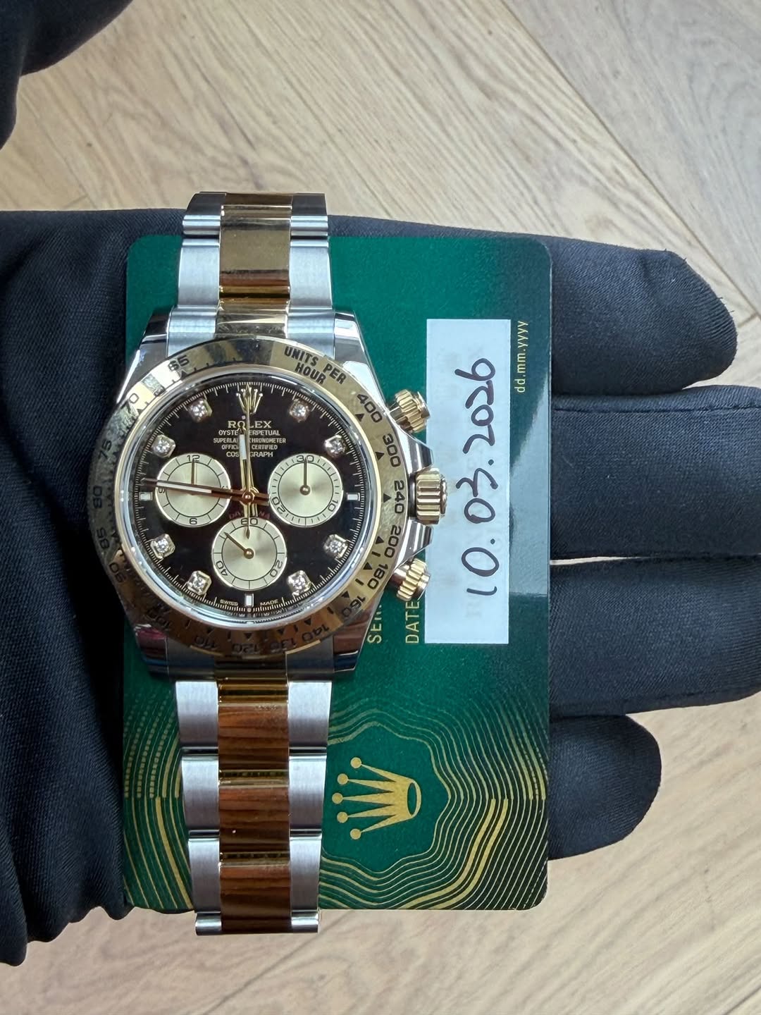 May be an image of wrist watch and text