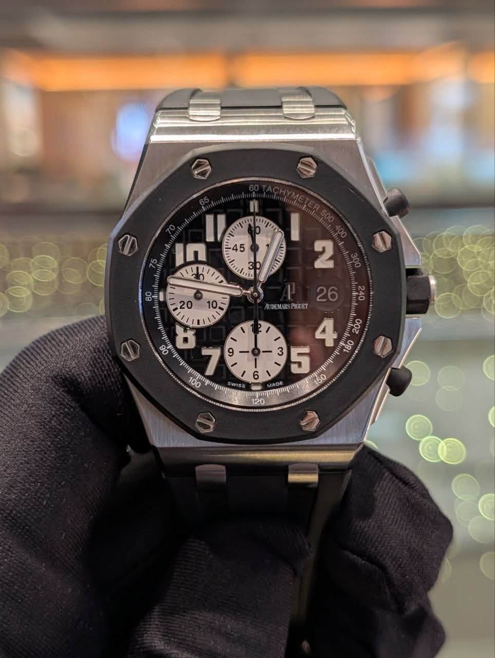 May be an image of wrist watch and text