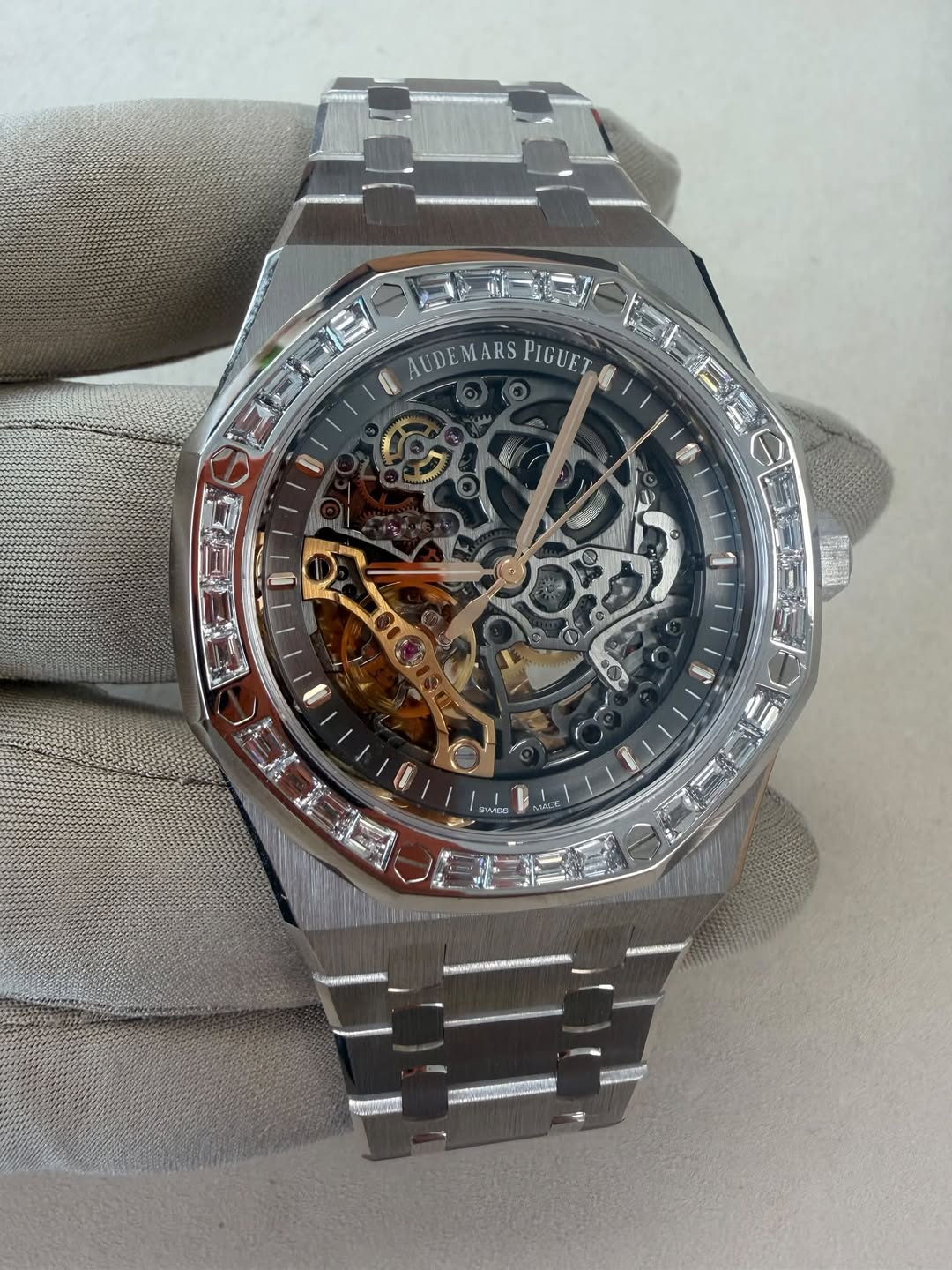 May be an image of wrist watch and text