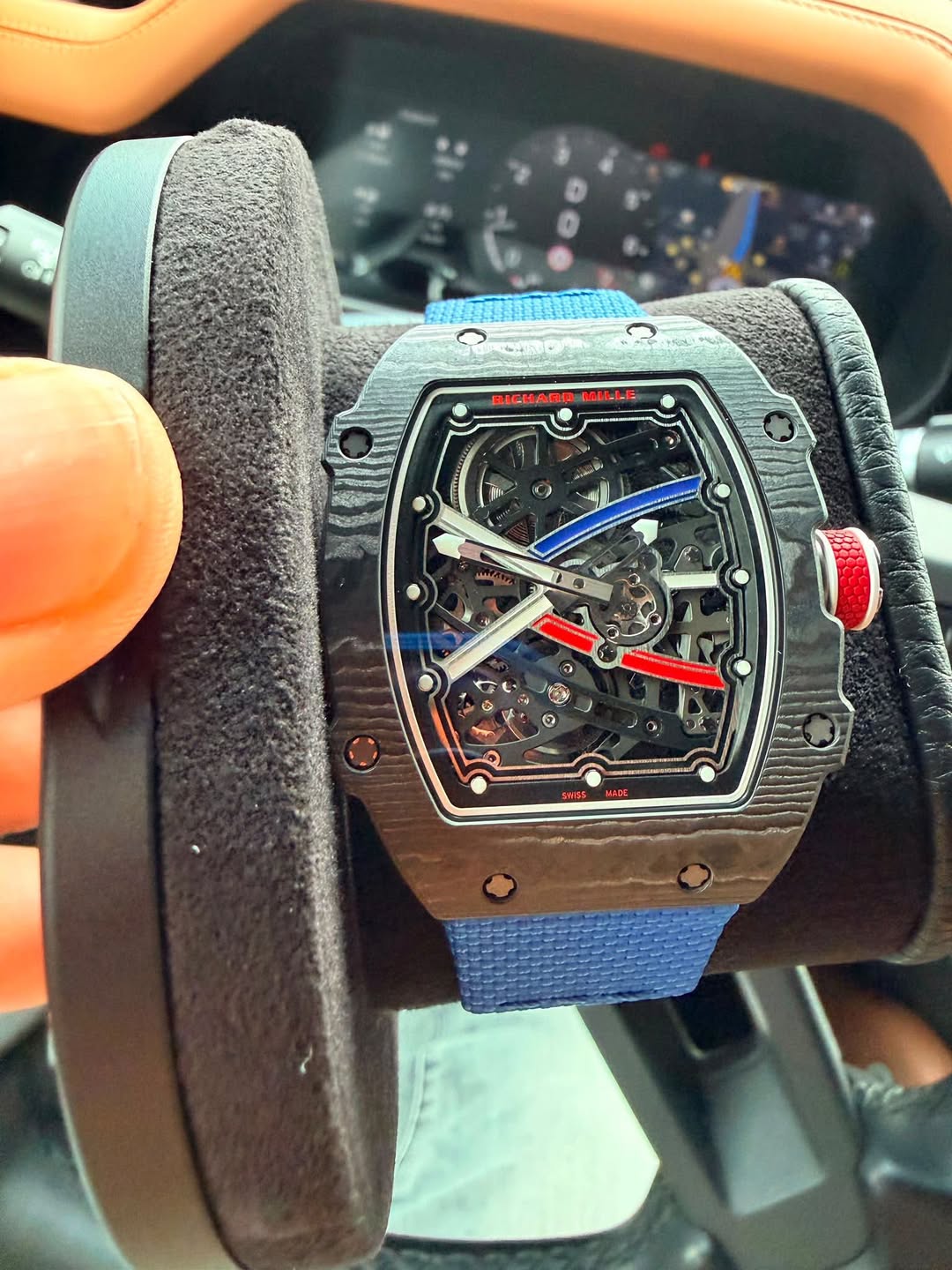 May be an image of wrist watch and text that says 'RICHARDMILLE สาต RICHARD MILLE か 1 ن t M + a 3 MISS'