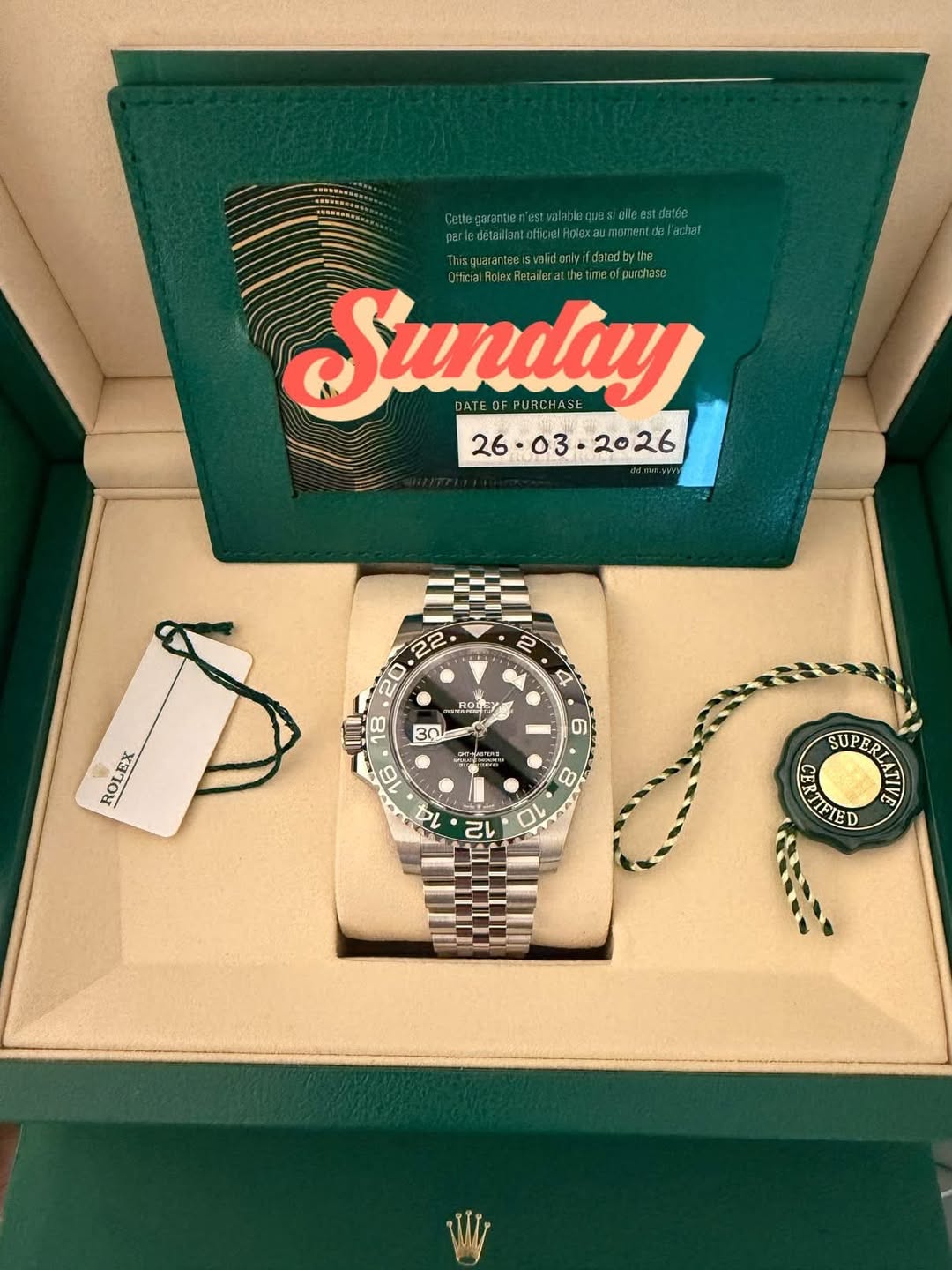May be an image of wrist watch and text
