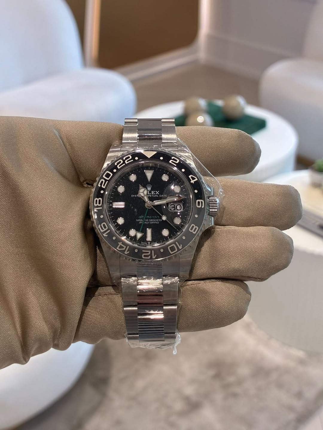 May be an image of wrist watch and text