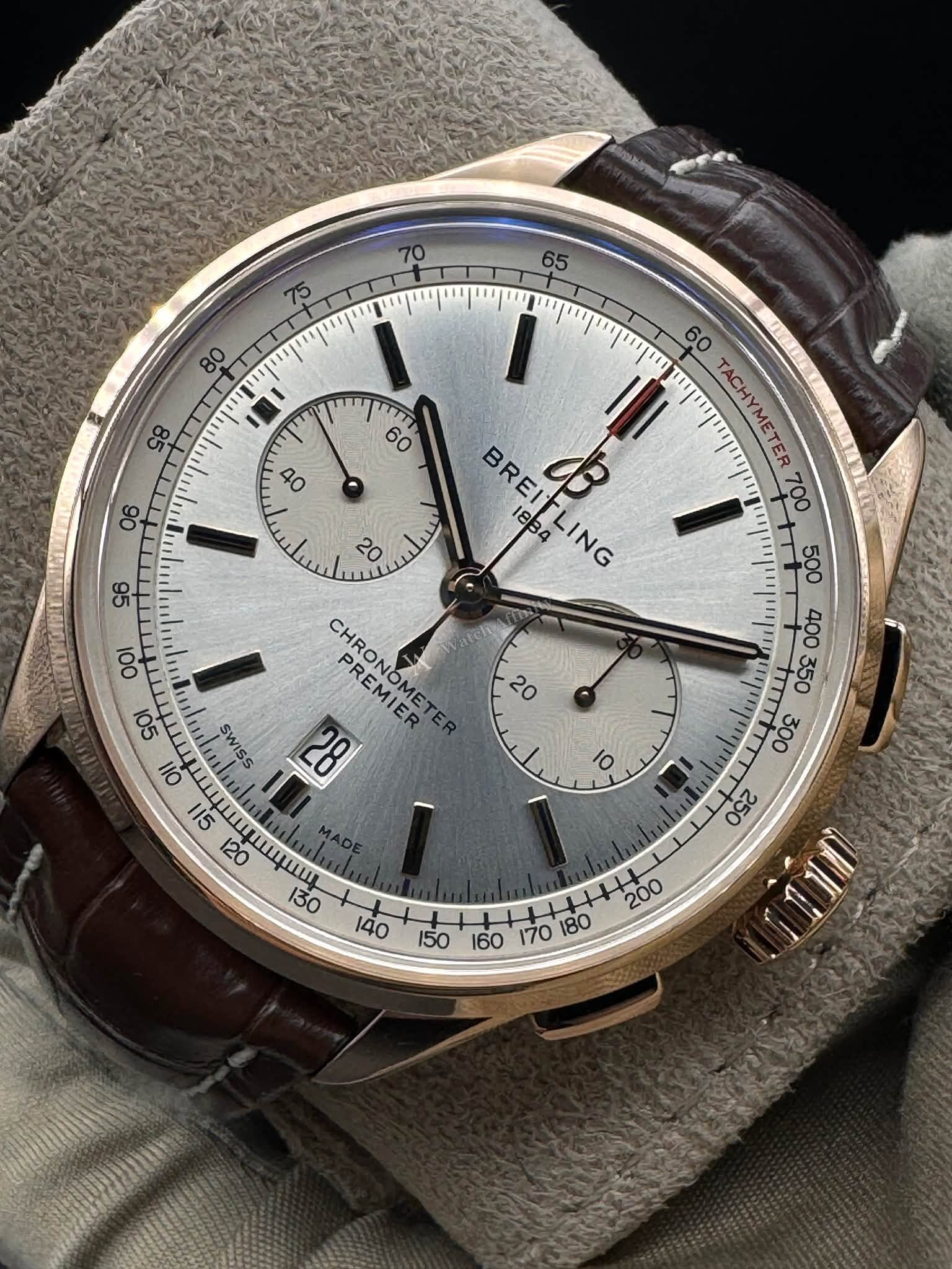 May be an image of wrist watch and text that says ' II TACHYMETE BREITLING BRE 03 100 18B0NG 1834 CHRONOMETI PREMIER SỘI OIl 28 ااء nwaииT oot 09도 000 T '