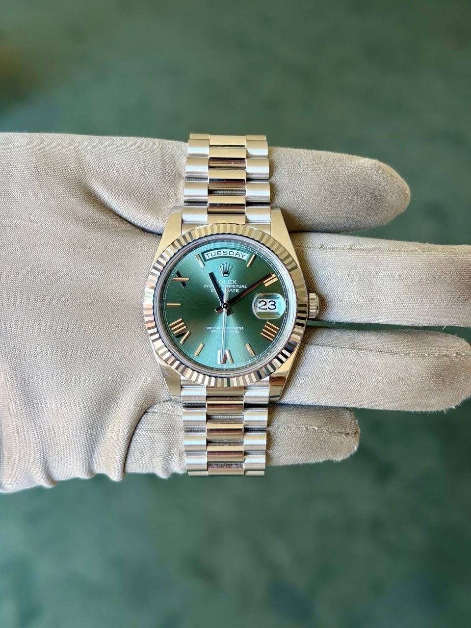 May be an image of wrist watch and text