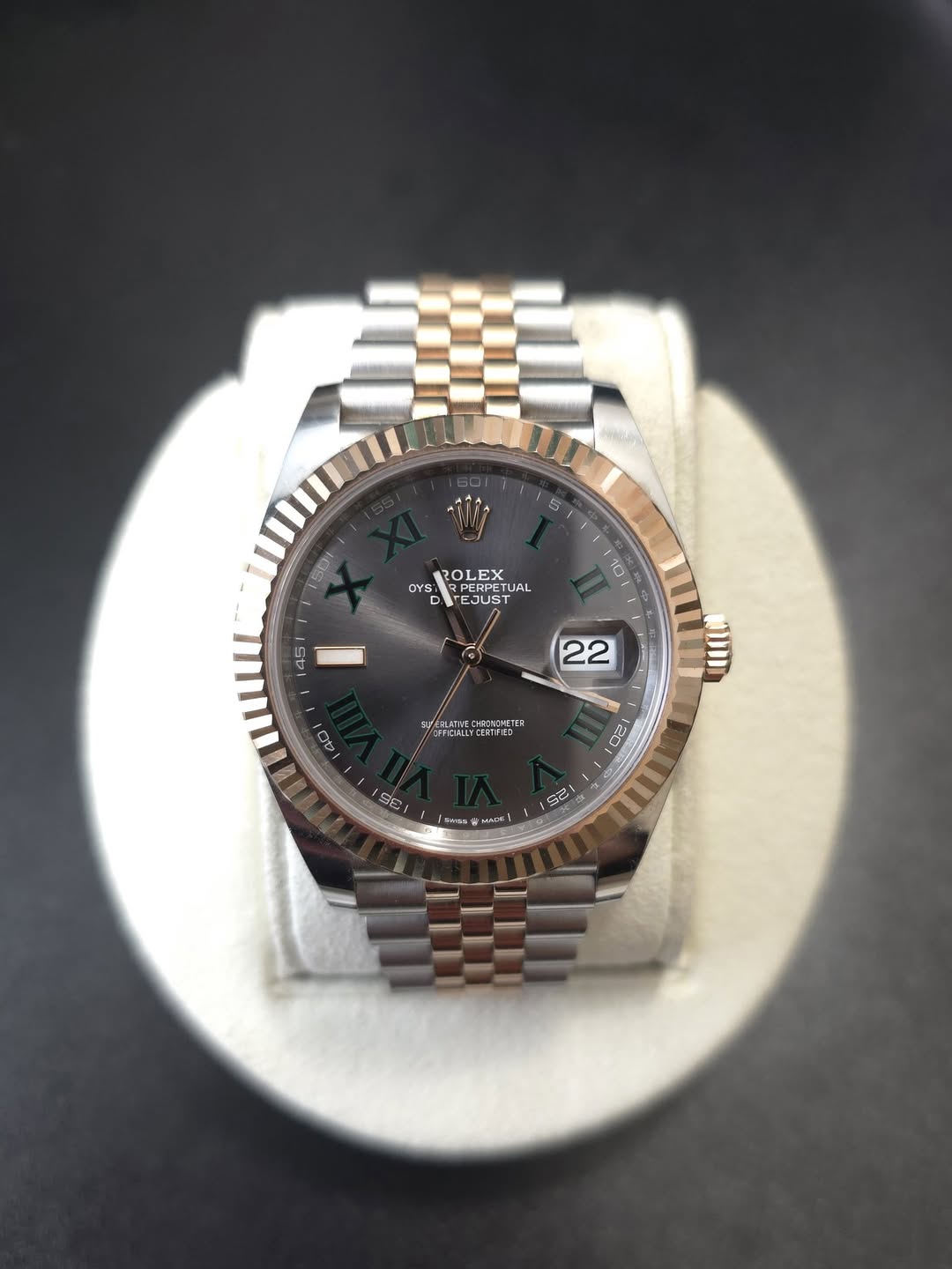 May be an image of wrist watch and text