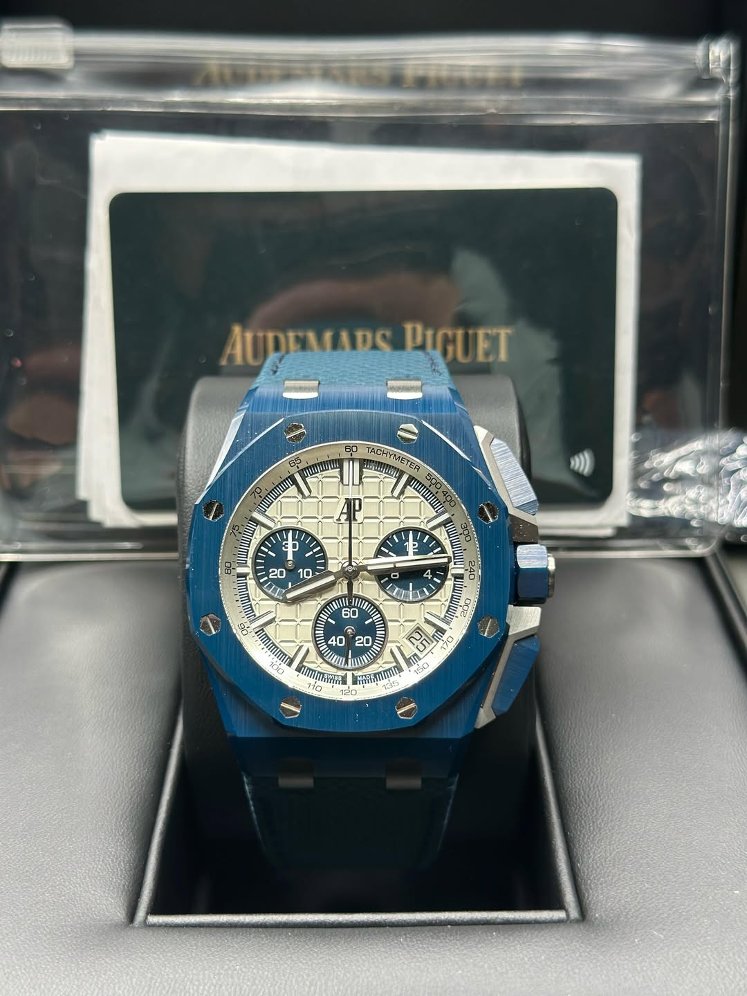 May be an image of wrist watch and text