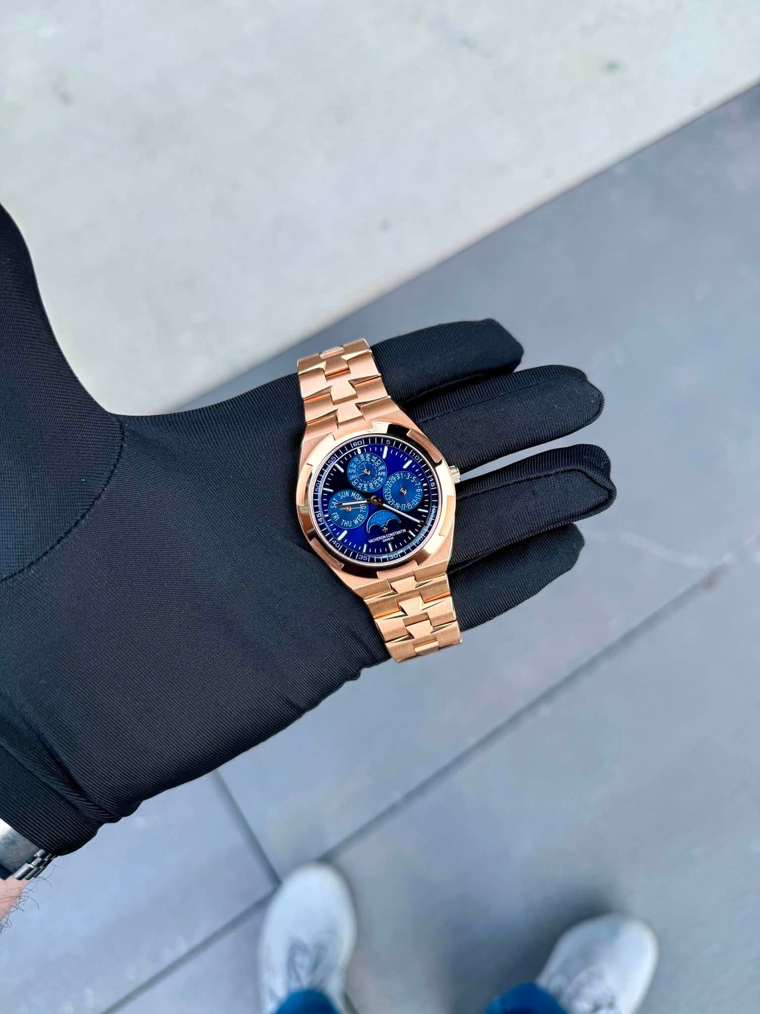 May be an image of wrist watch and text