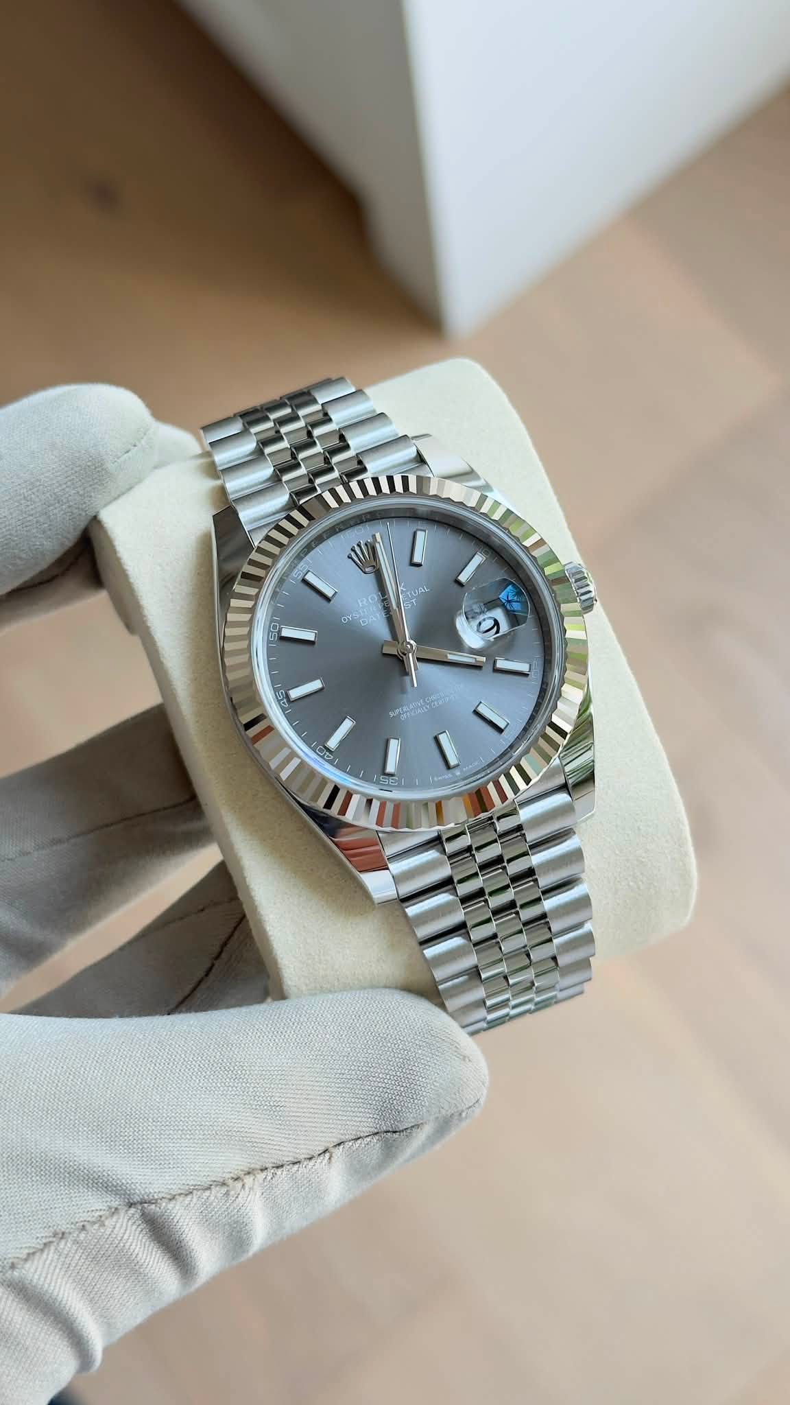 May be an image of wrist watch and text that says 'a'