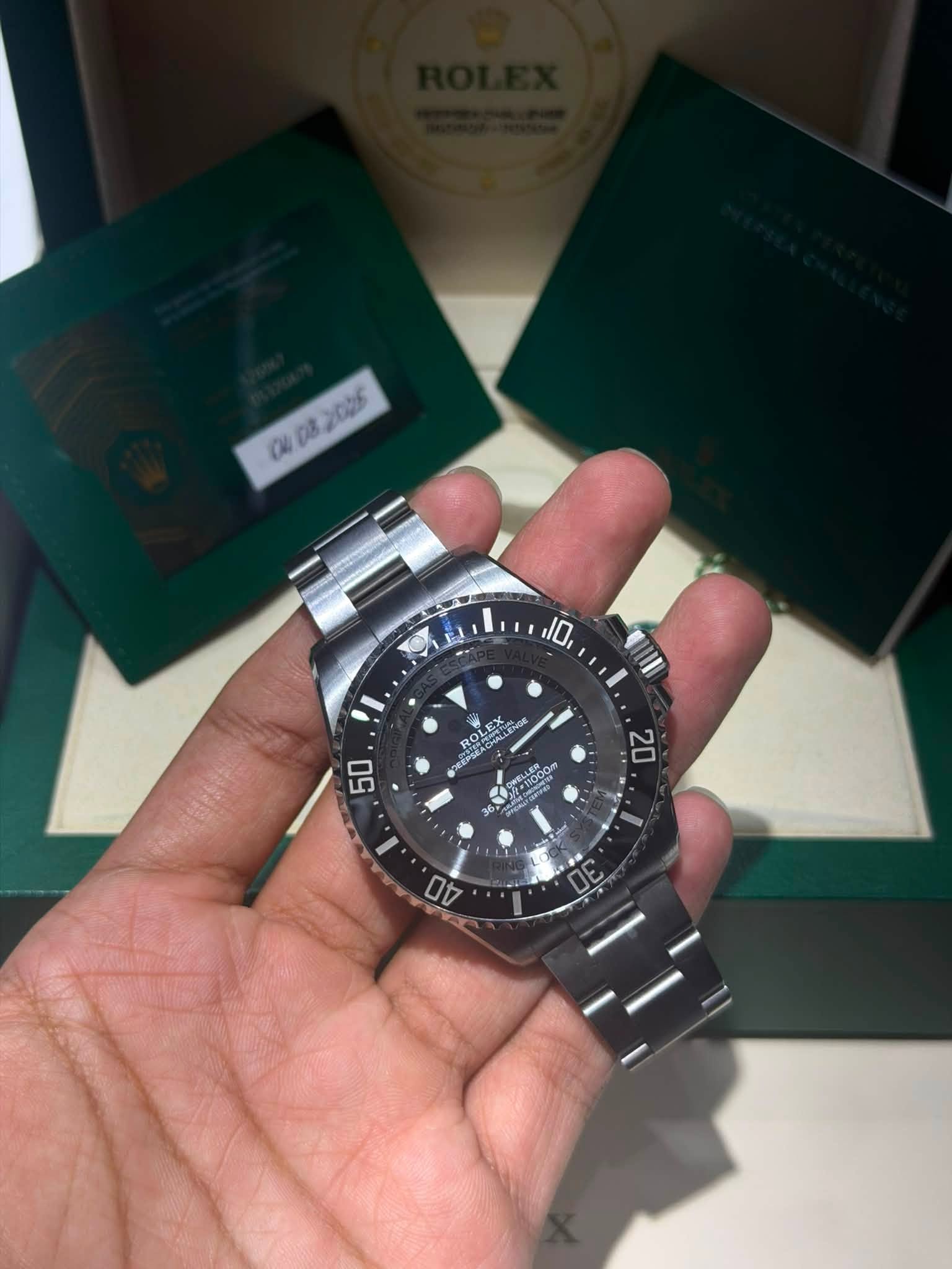 May be an image of wrist watch and text