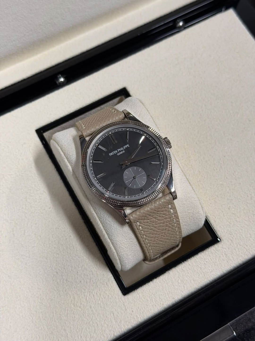 May be an image of wrist watch and text