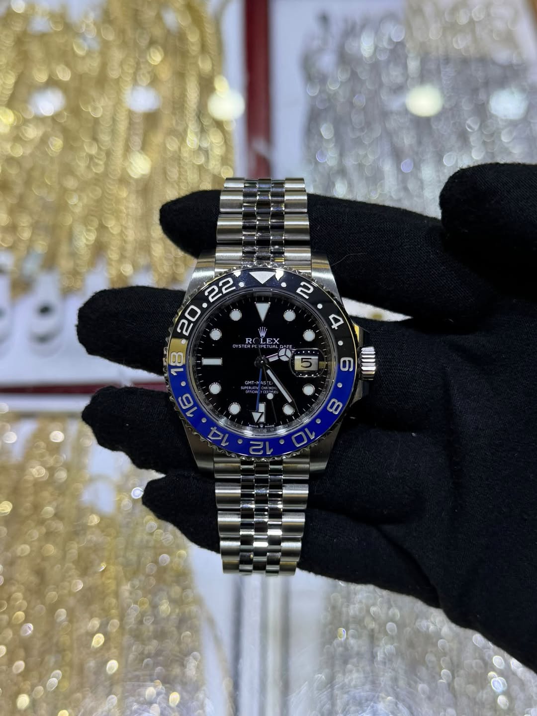 May be an image of wrist watch and text