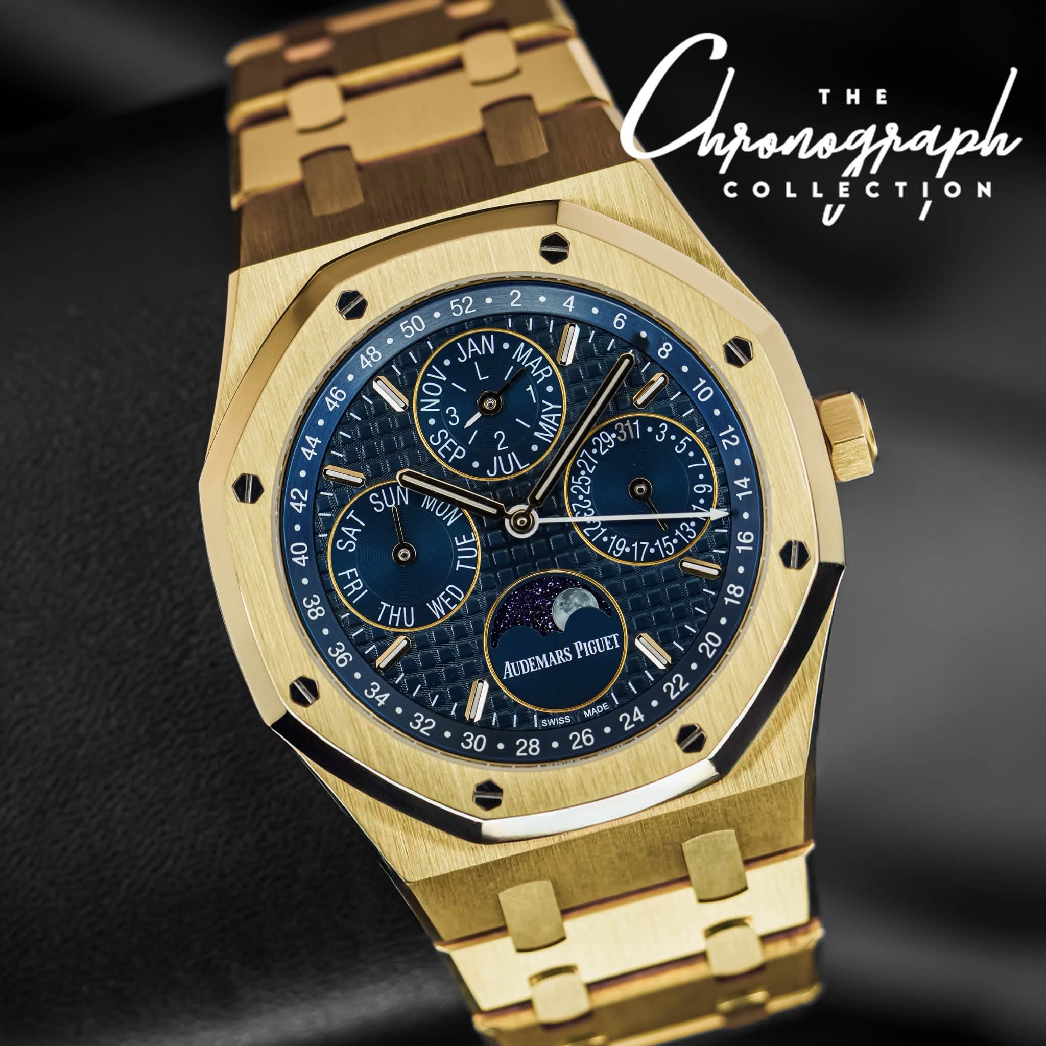May be an image of wrist watch and text that says 'Ajanizjaph THE COLLECTION MAD AN νοι 3 3 SEP JUL 2 OИ 8 10 12 紅 42 20. SU MUN o 40 か 6 9L FRI 8 THU WED 36 34 18 AUDEMARS PIGUET…