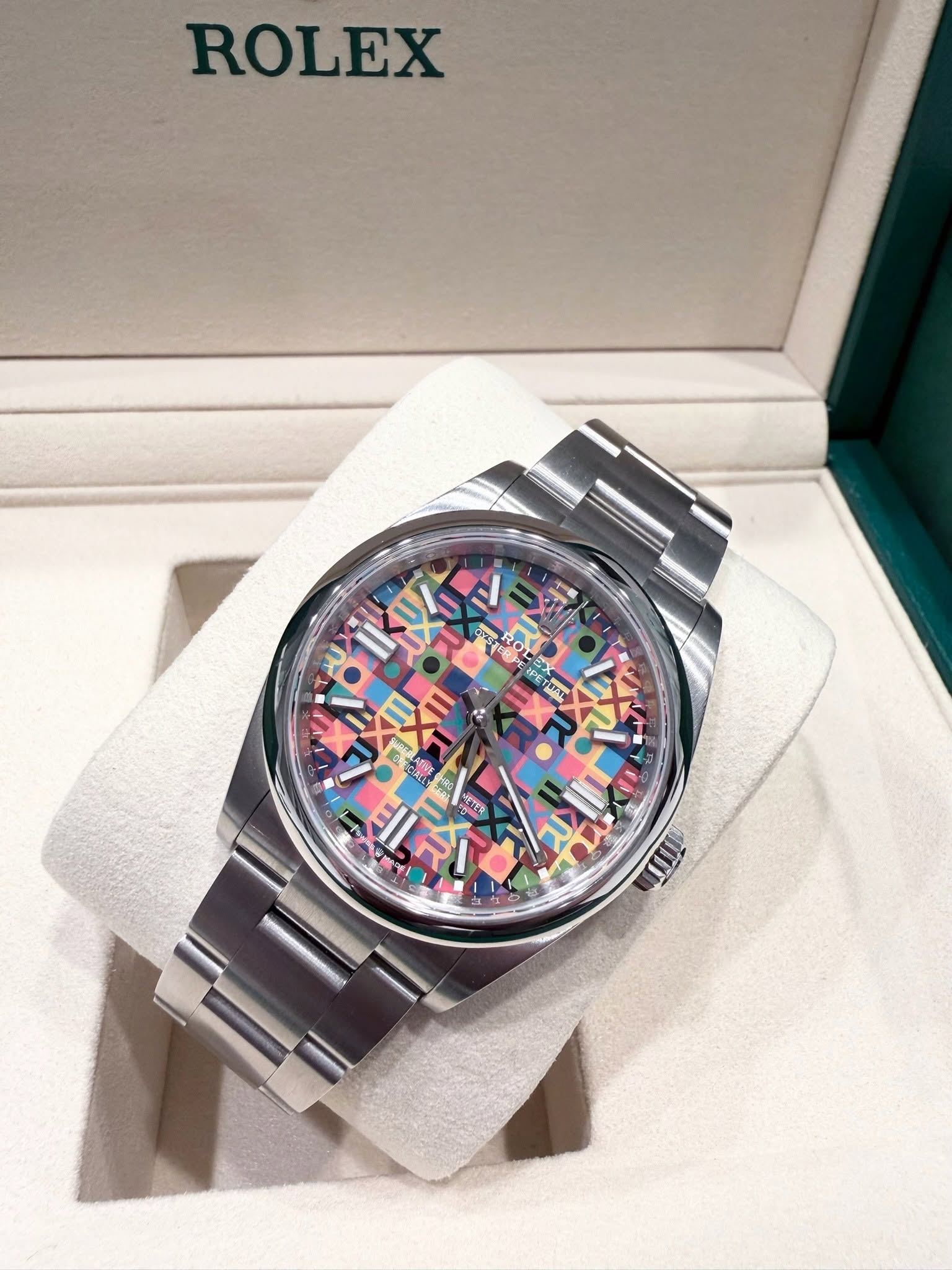 May be an image of wrist watch and text