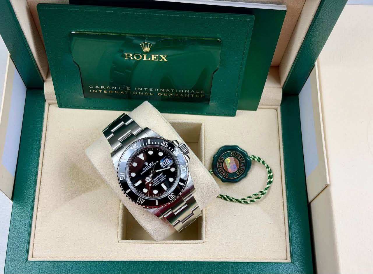 May be an image of wrist watch and text that says 'ROLEX GARANT INTERNAT ON 10 I UUI 22 50 ROLE OLEX SNONG V 天 2 20 AO ✓ لم C'