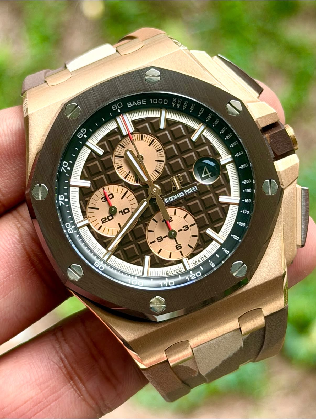 May be an image of wrist watch and text