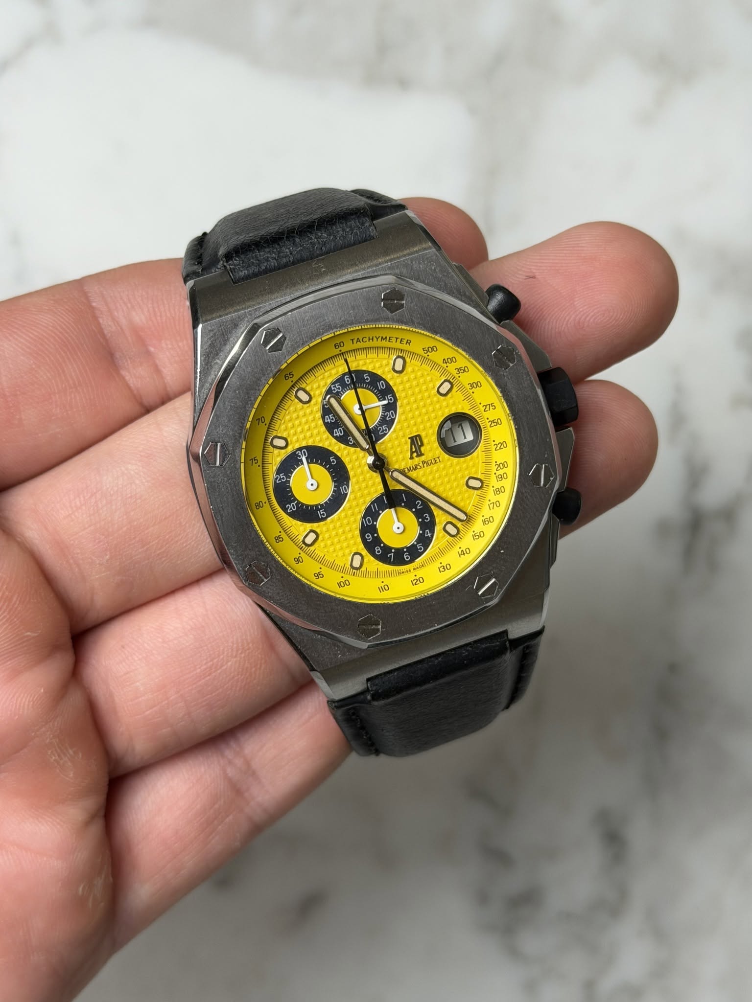 May be an image of digital watch and text