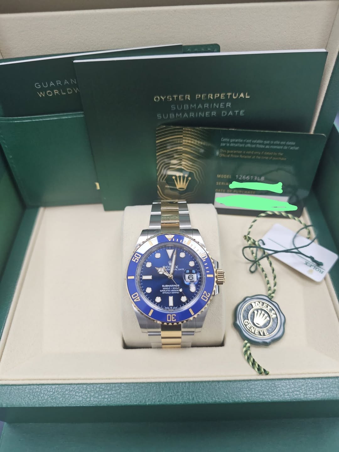 May be an image of wrist watch and text that says 'GUAR WORL OYSTERPERPETUAL PE RPETUAL OYSTERP 50 مسد لاحة 6 1300432M VOLE AO XPOY 20 6 BOLET PENEY'
