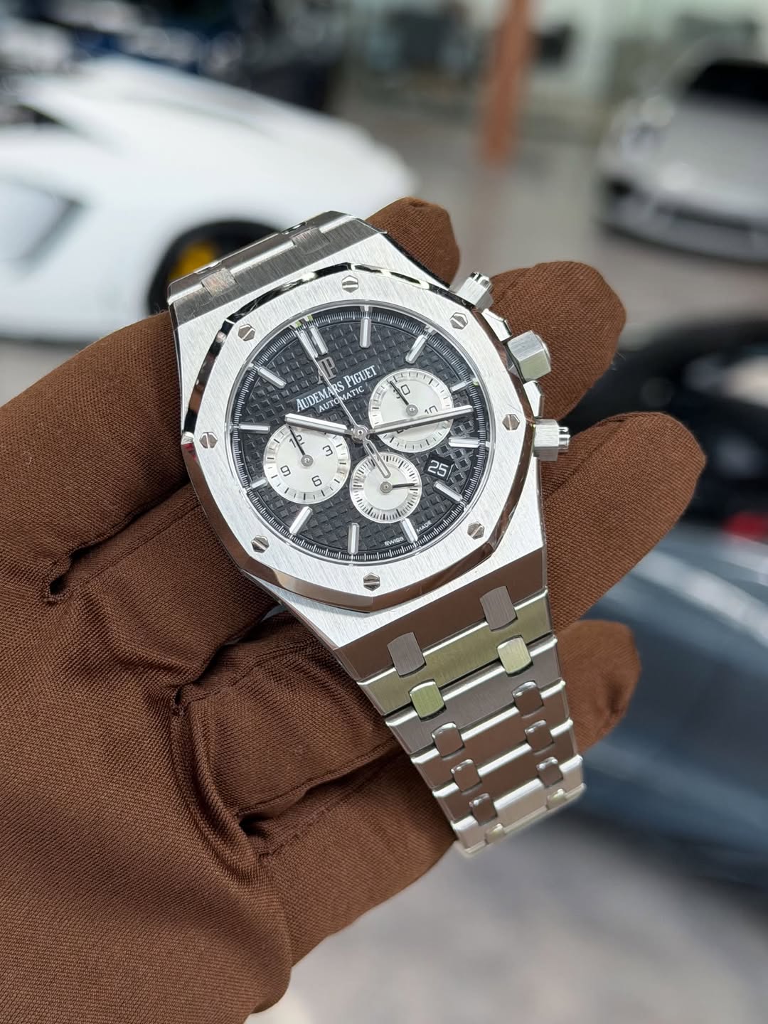 May be an image of wrist watch and text