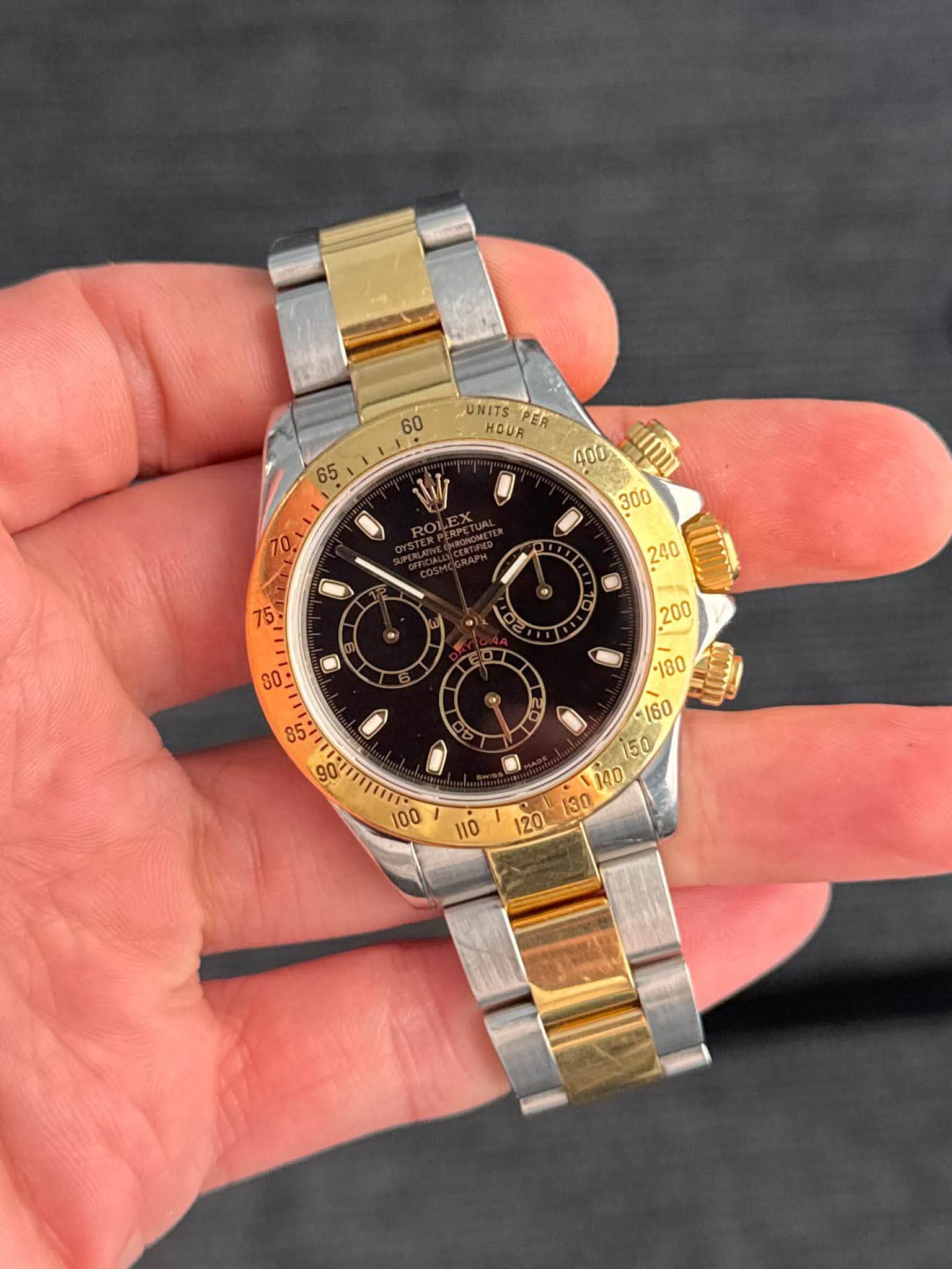 May be an image of wrist watch and text that says '60 UNITS HOUR PER 65 W RO و aO S '