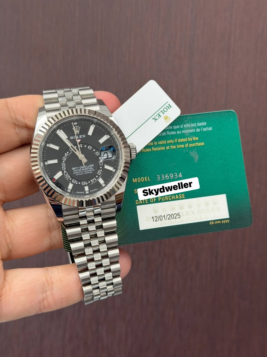 May be an image of wrist watch and text that says 'Rd ROLEX LE EX X3TOΥ 4 ella llee est datée noment 'achat Rolex eeIs valid anlyif dated the Holex Retailer the the time purchase…