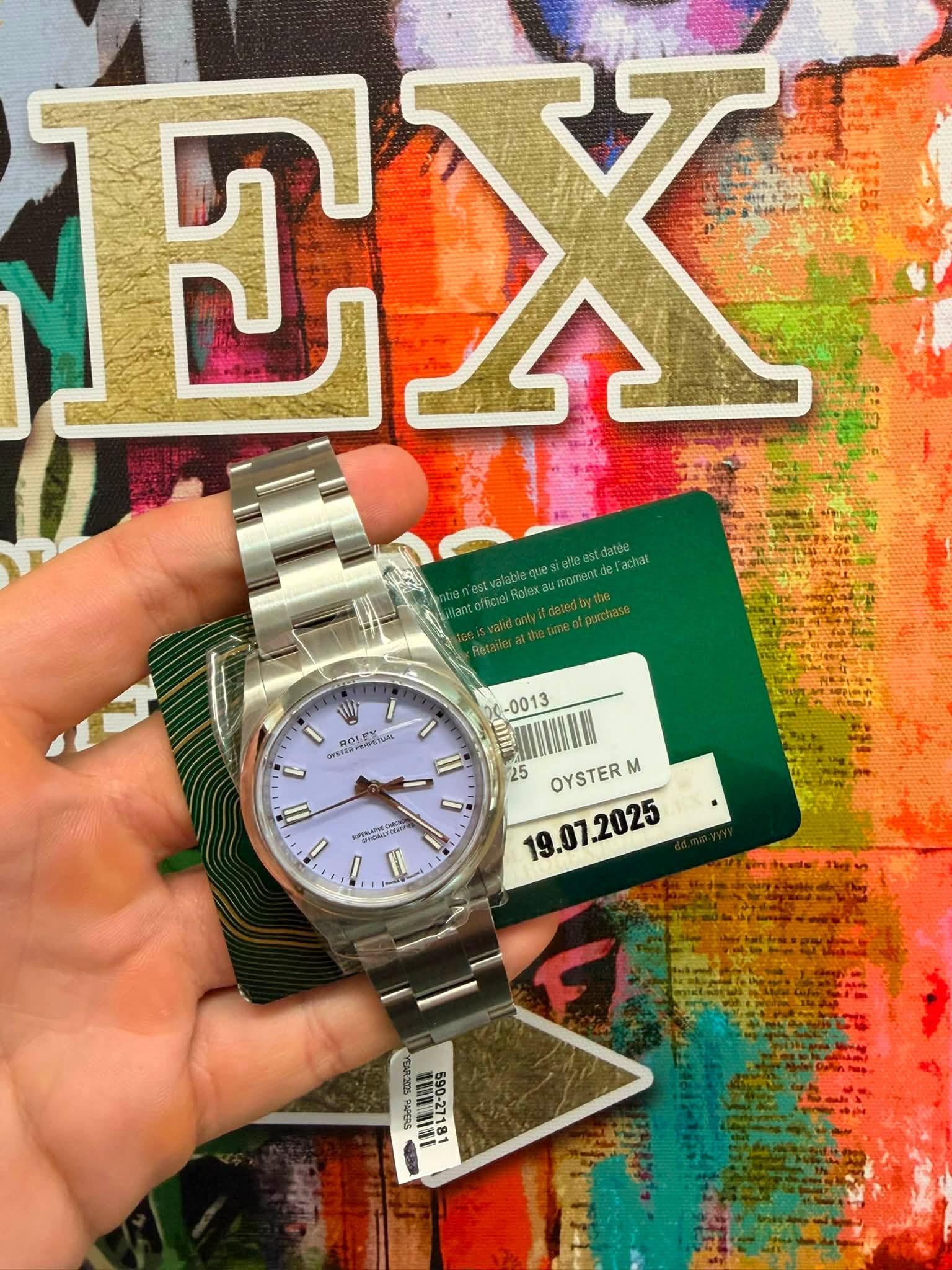 May be an image of wrist watch and text