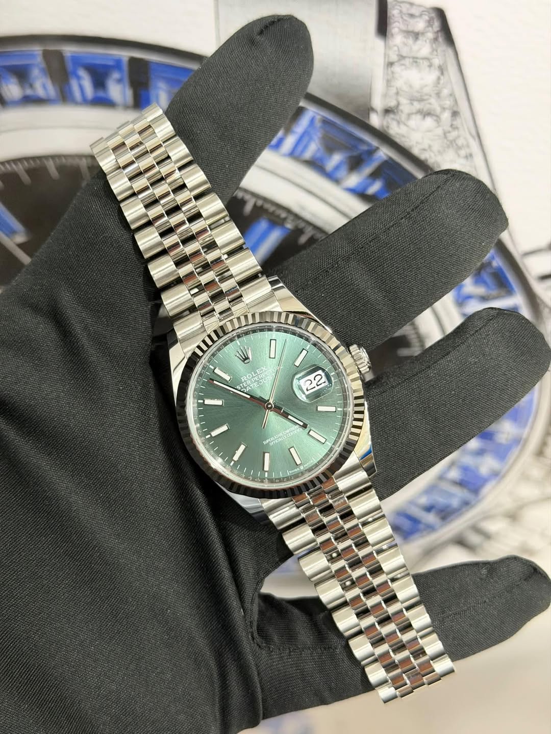 May be an image of wrist watch and text