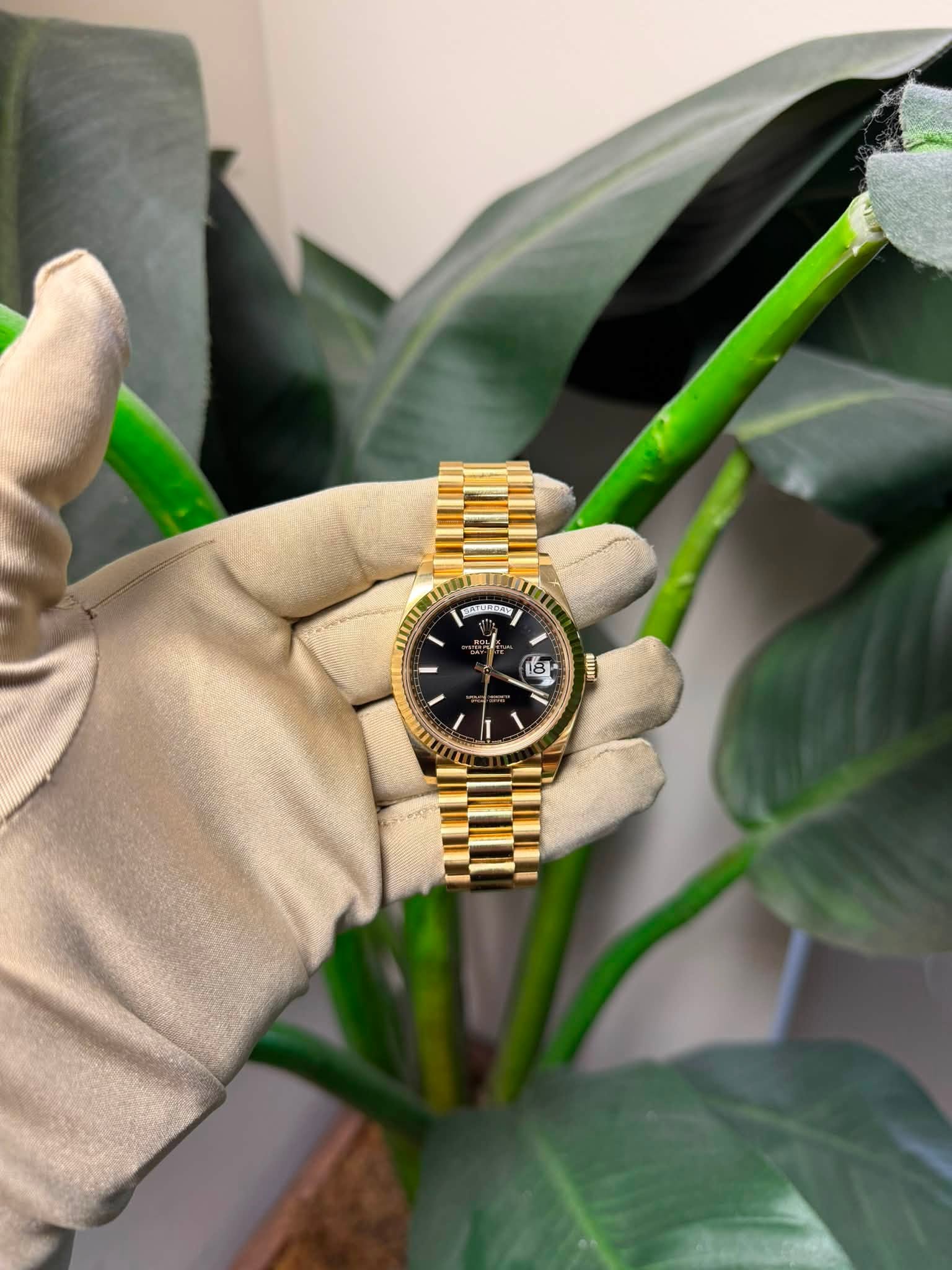 May be an image of wrist watch and text