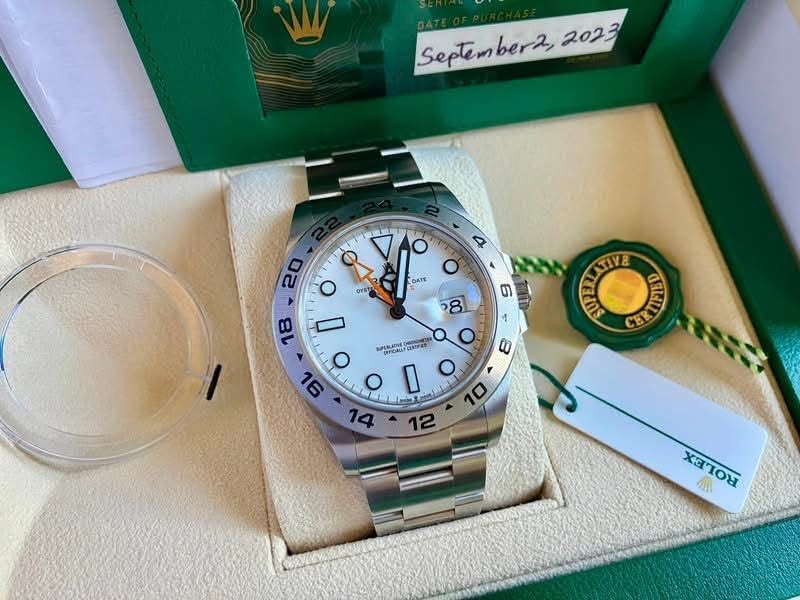 May be an image of wrist watch and text