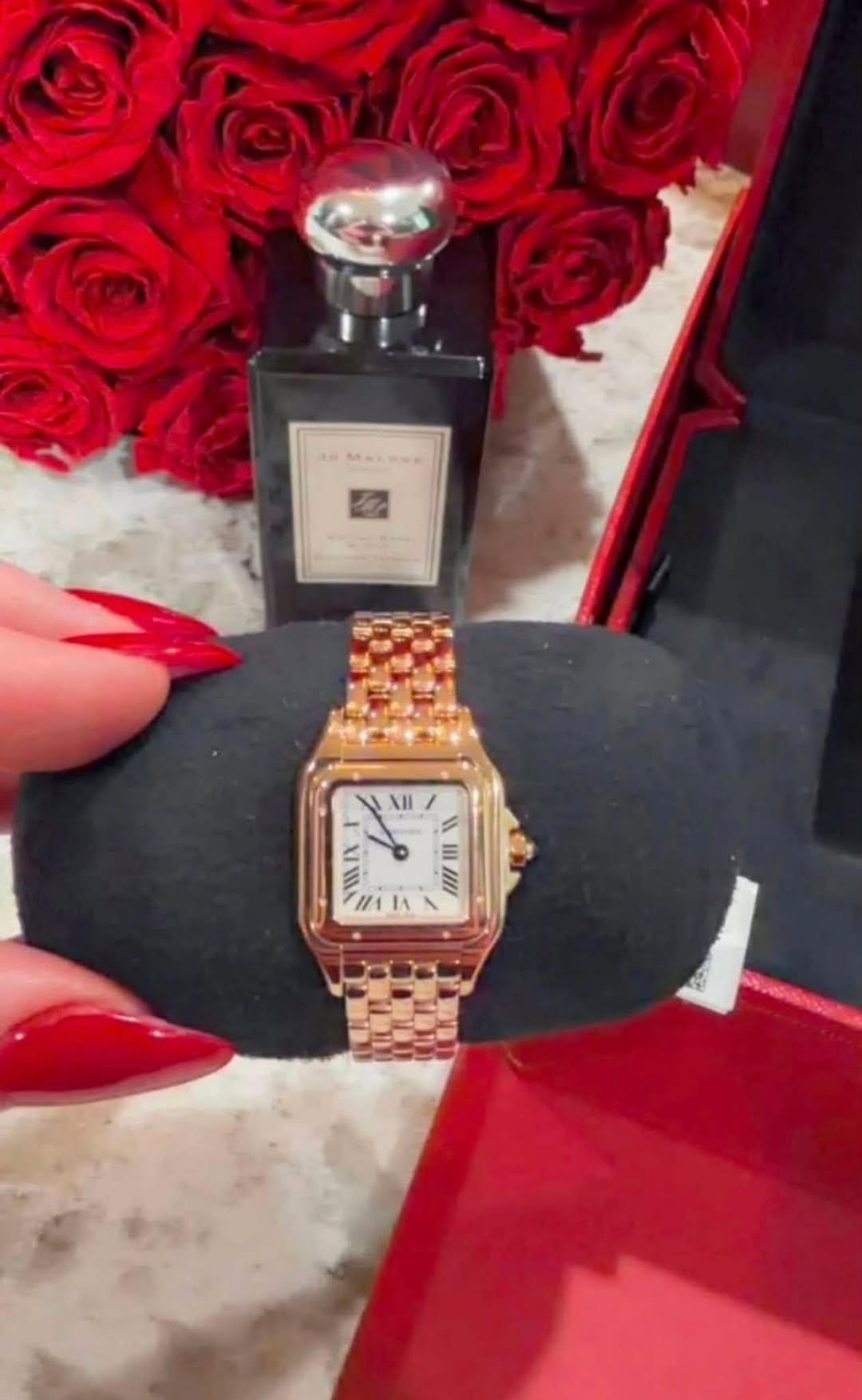 May be an image of wrist watch and text