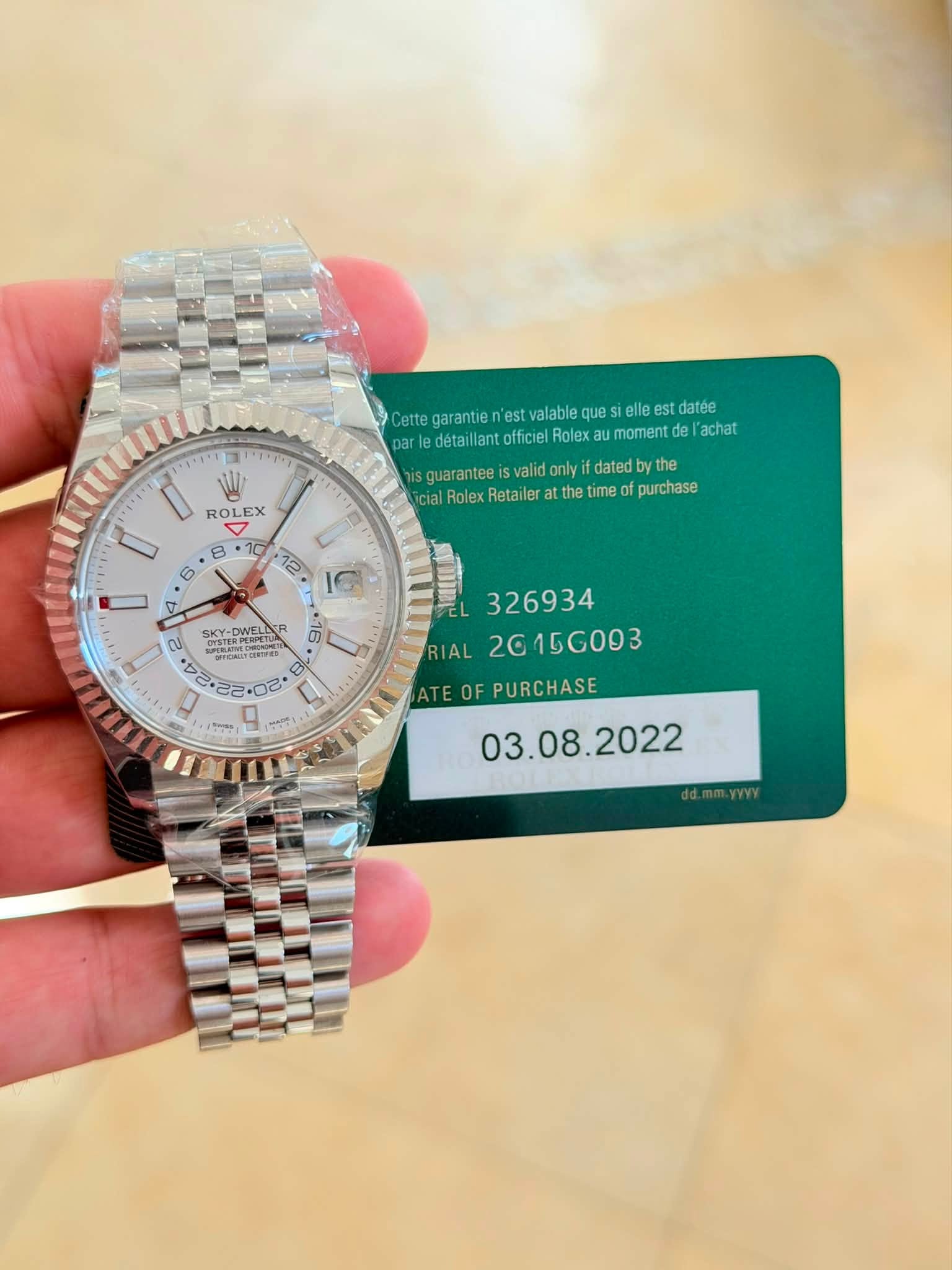 May be an image of wrist watch and text