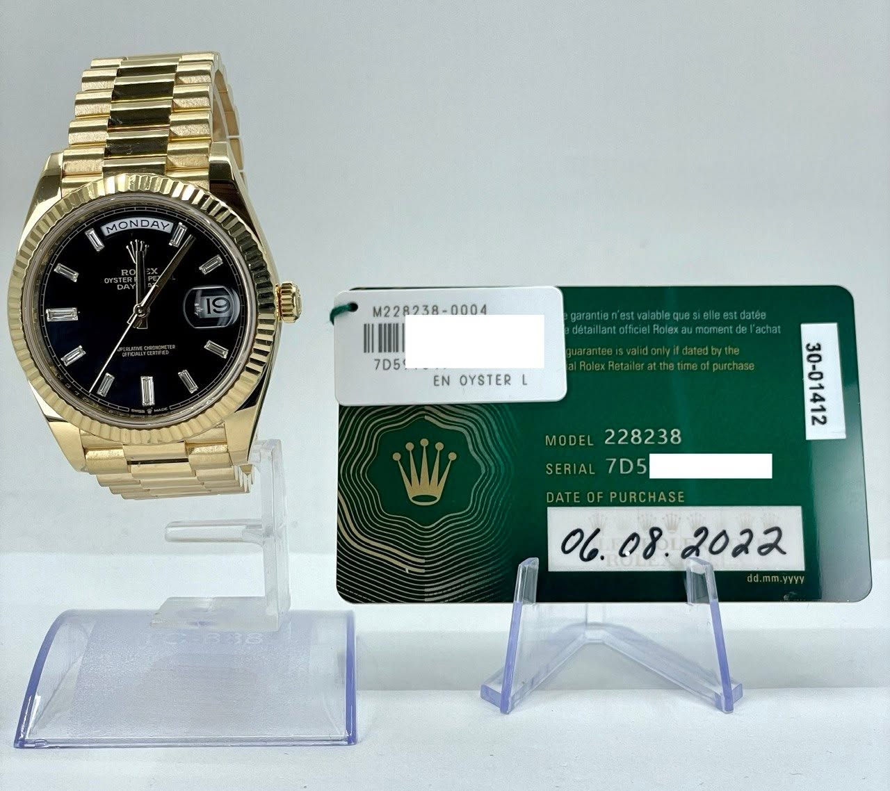 May be an image of wrist watch and text